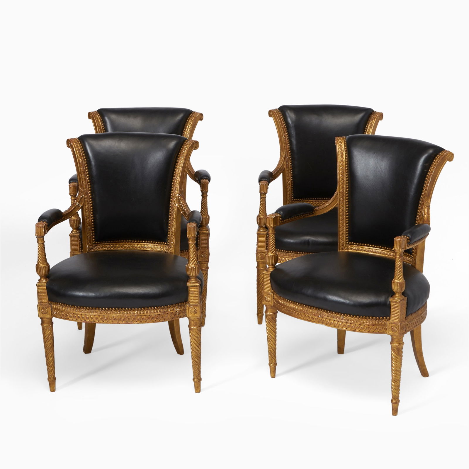 Set of Four Directoire Leather Upholstered Carved Giltwood Fauteuils En Cabriolet: Circa 1795