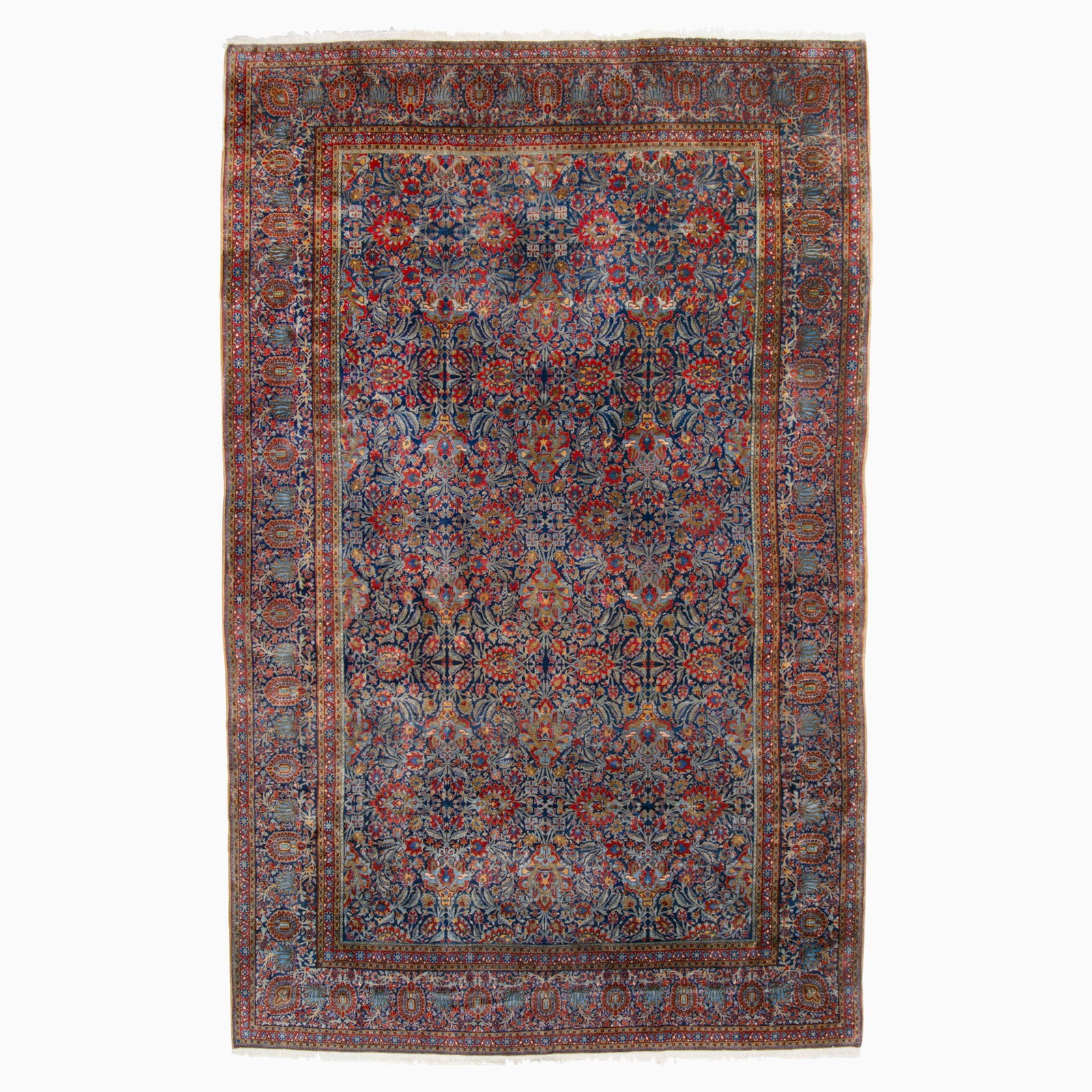 Manchester Kashan Carpet: Central Persia, First 1/4 20th CenturyThe indigo field with polychrome floral vinery overall is within a palmette and meandering vine border.15 feet 8 inches x 10 feet 0 inches. Small areas of
