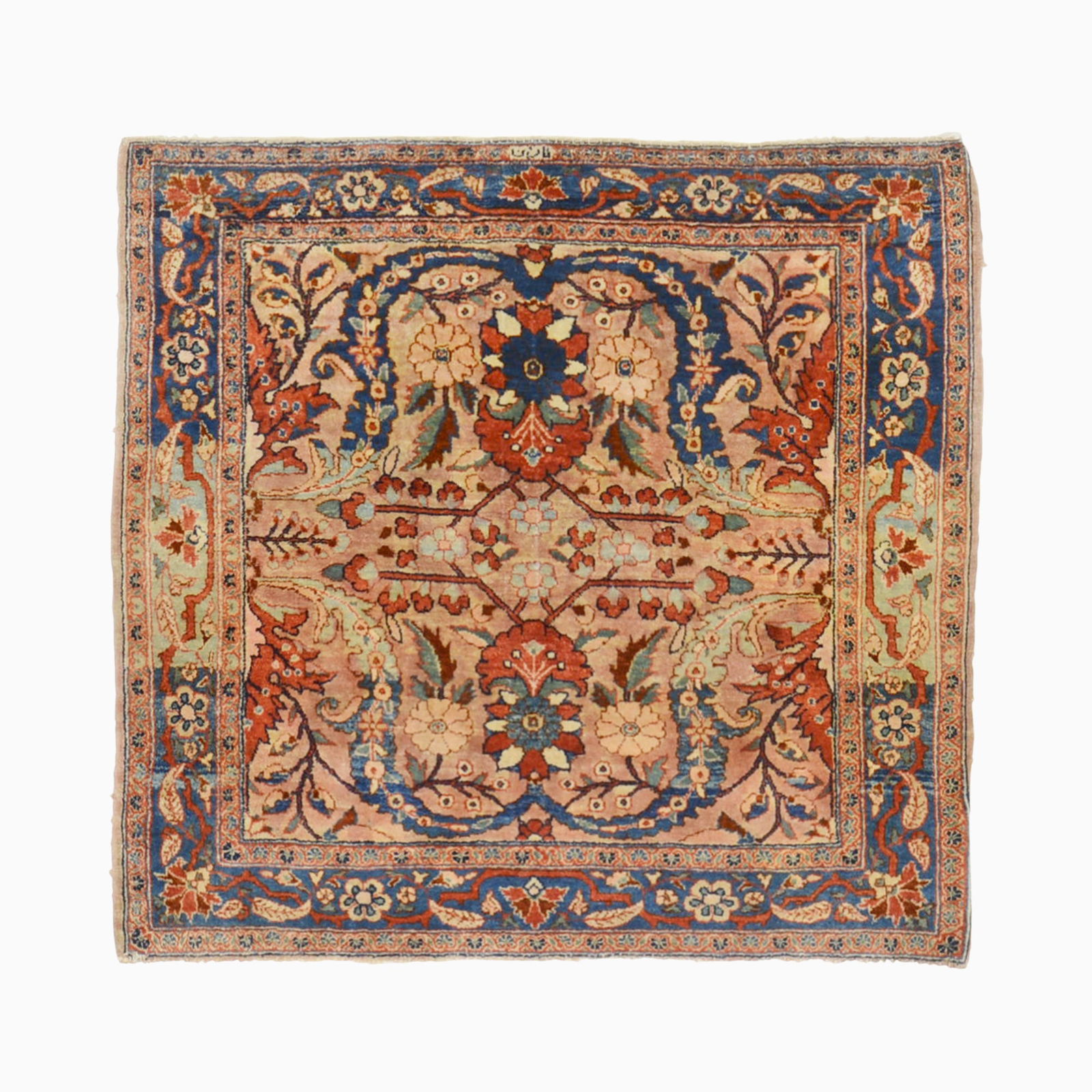 Sarouk Fereghan Rug: North Persia, First 1/4 20th CenturyTwo palmettes flanked by leaves on the mauve field is within an indigo floral vinery border.3 feet 1 inch x 2 feet 10 inches. Minor losses to ends, small breaks