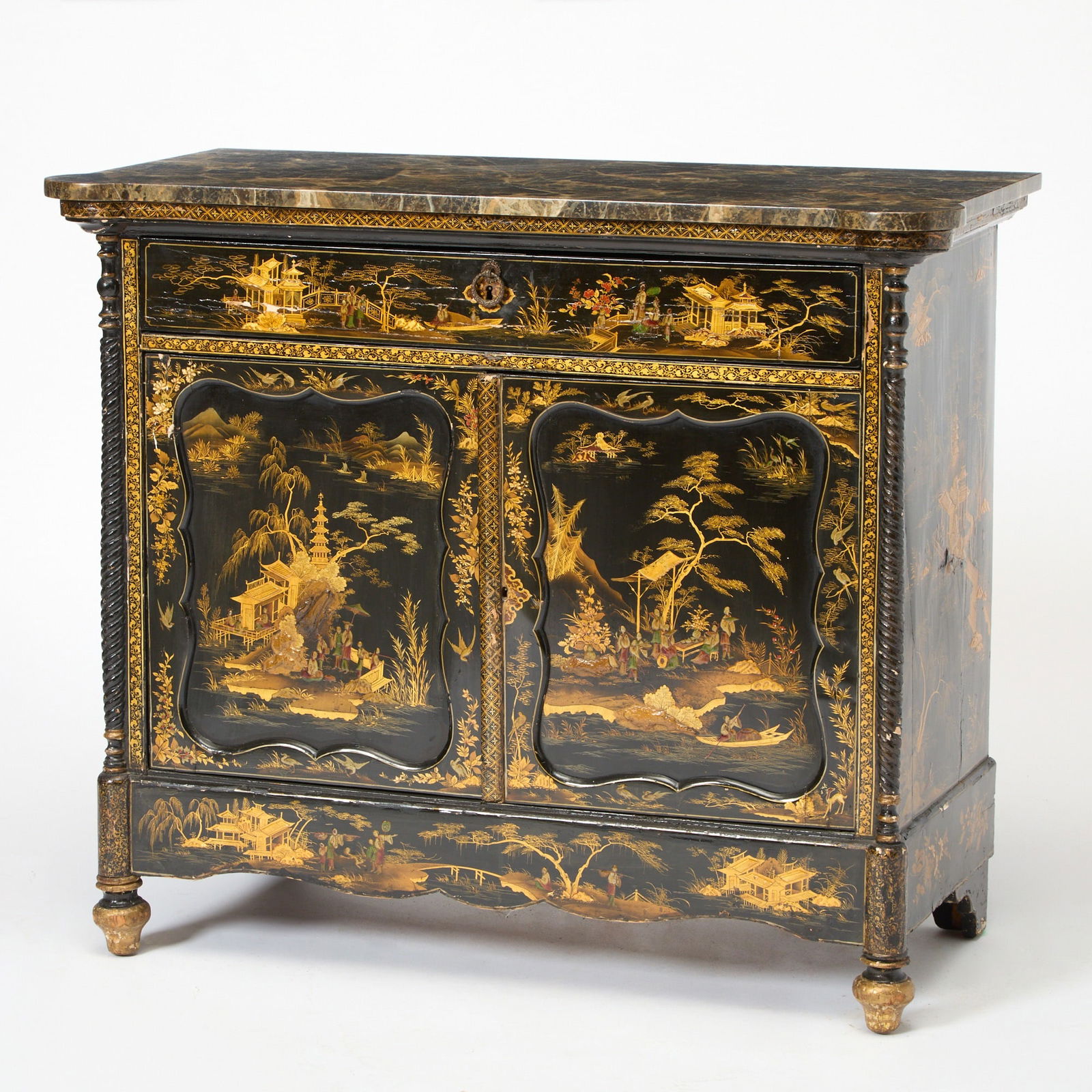 Late Regency Chinoiserie Decorated Lacquer Cabinet: First half 19th centuryThe associated faux painted marble top with rounded outset corners, above a frieze drawer and pair of panel doors enclosing a shelf, flanked by spiral pilasters, on toupie feet.