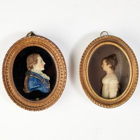Pair of Regency Framed Wax Portrait Miniatures of a Lady and a Gentleman