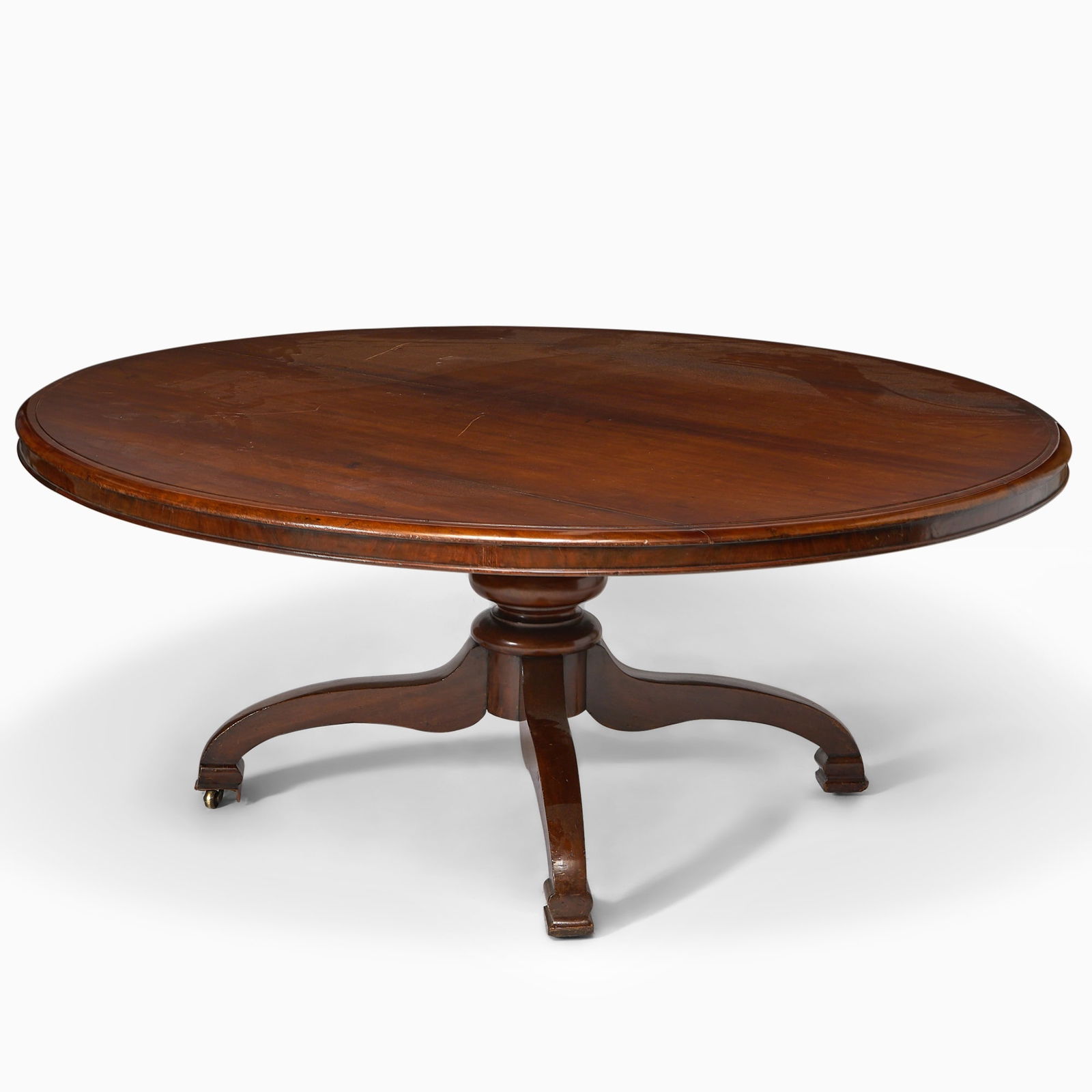 William IV Mahogany Circular Dining Table: Circa 1830Height 29 1/2 inches (75 cm), diameter 70 inches (178 cm)Provenance: Michael Luther, London, June 21, 2000.