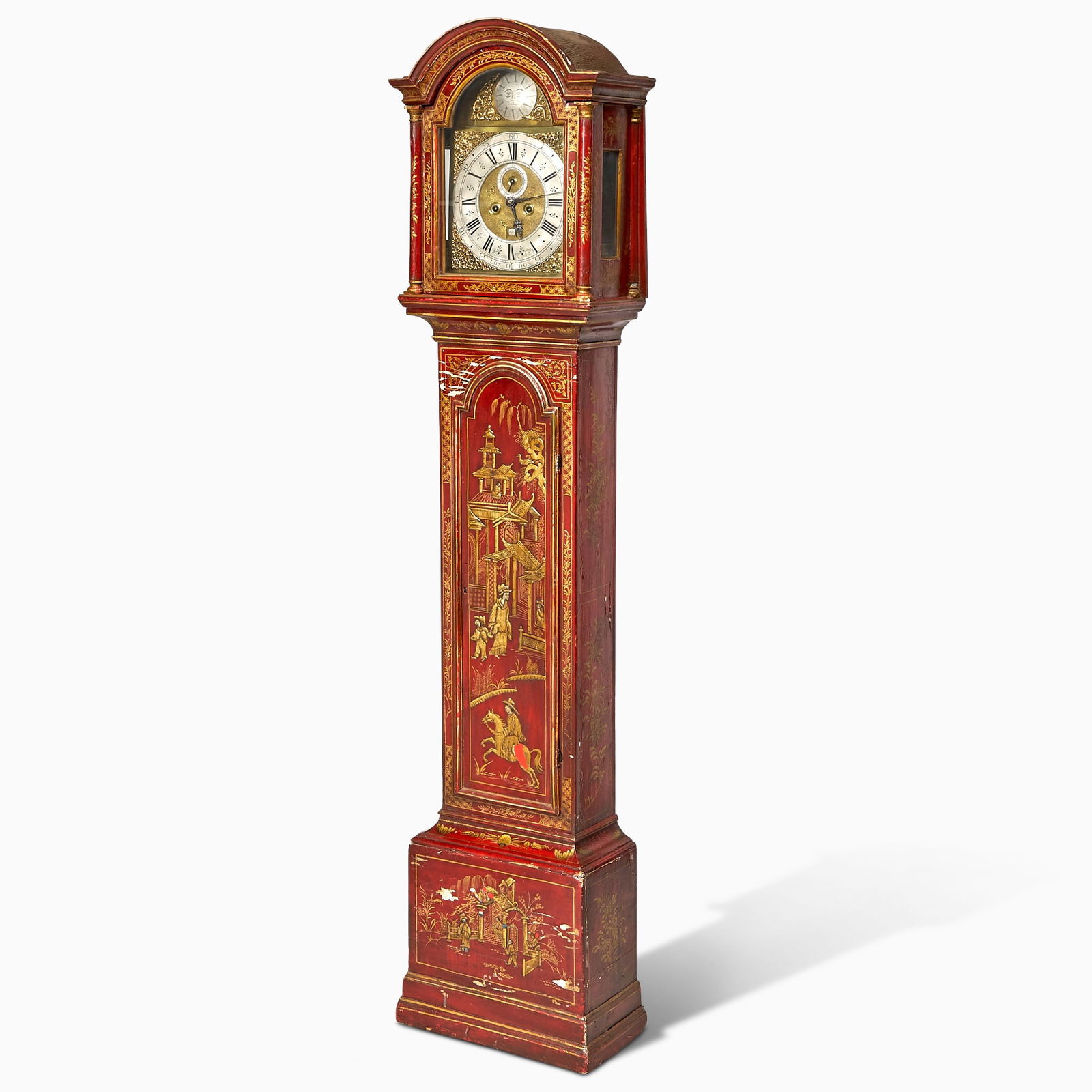 George II Style Red-Japanned and Parcel-Gilt Longcase Clock: Partially composed of older elements, the arched hood with glazed door and sides opening to an associated movement, the five-pillar movement with subsidiary seconds dial and date aperture, the silvere