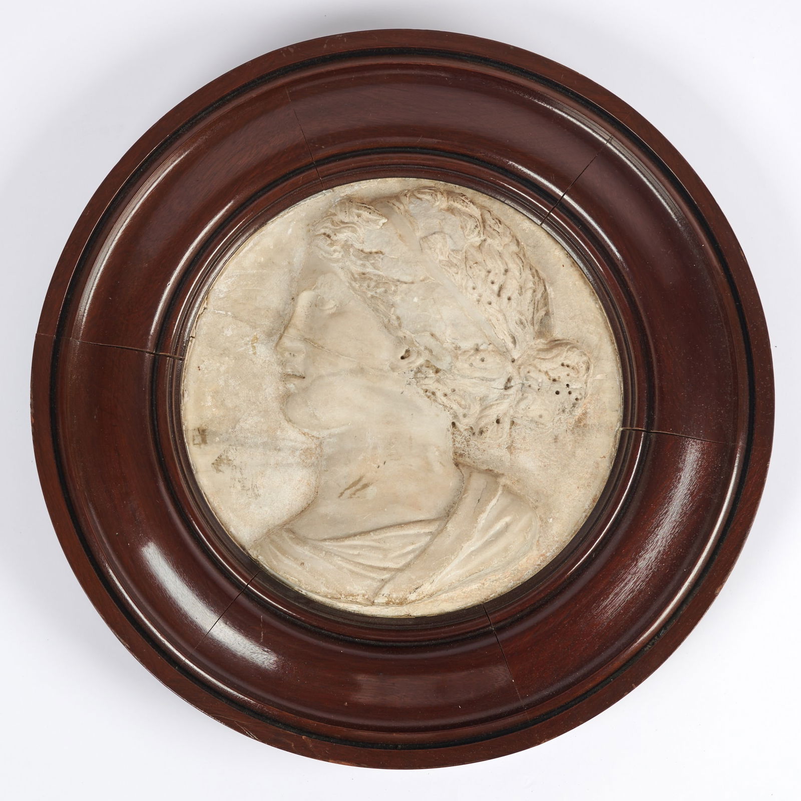 Italian Renaissance White Marble Portrait Relief of a Lady: Late 16th century Sight diameter 13 1/4 inches (33.6 cm), overall 22 inches (55.9 cm). Previous restorations, minor surface wear and abraison consistent with age; small edge chips, stable hairline cr