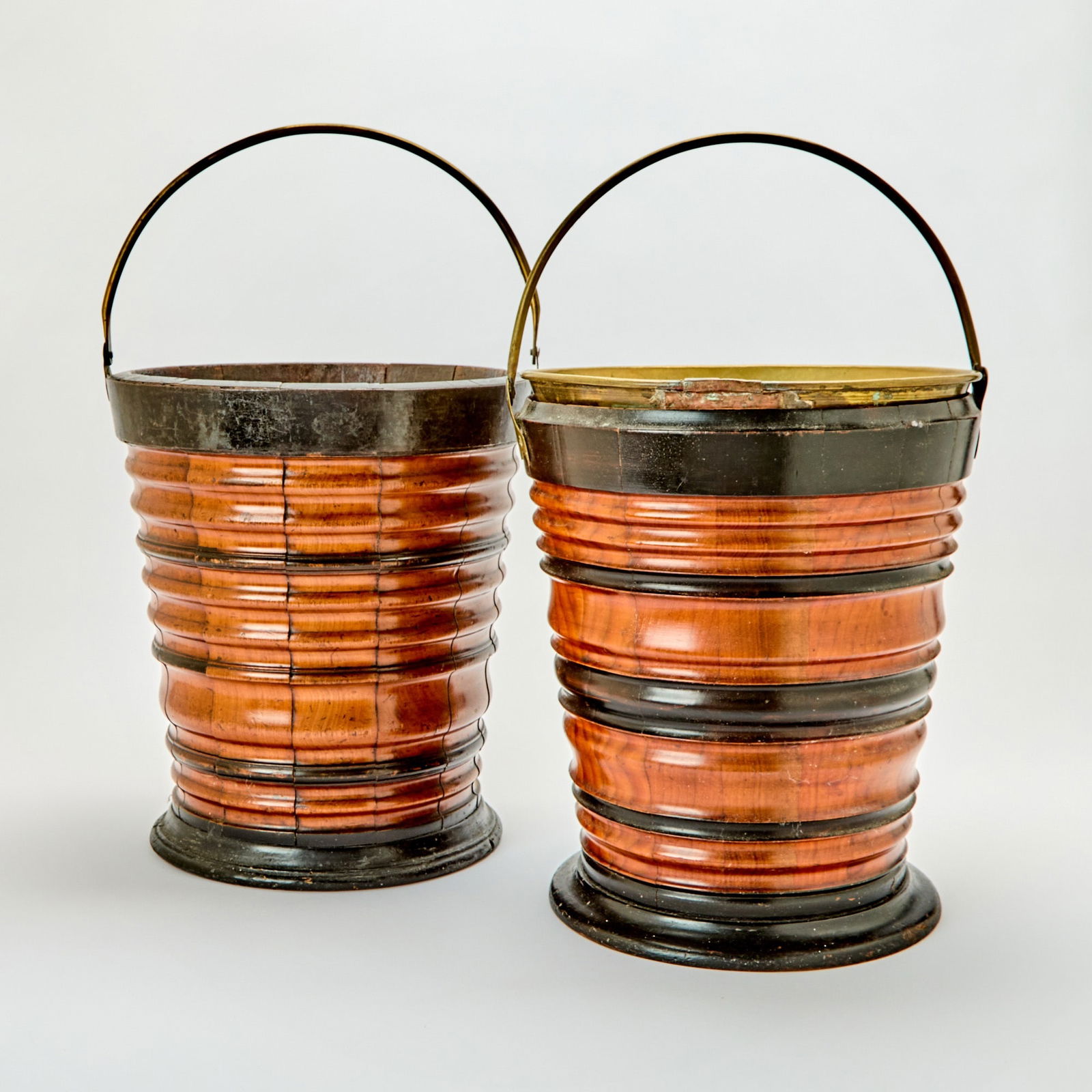 Two Dutch Fruitwood and Ebonized Peat Buckets: Circa 1800 One with brass liner. Height 13 1/2 inches (34.5), diameter 12 inches (30.5 cm).