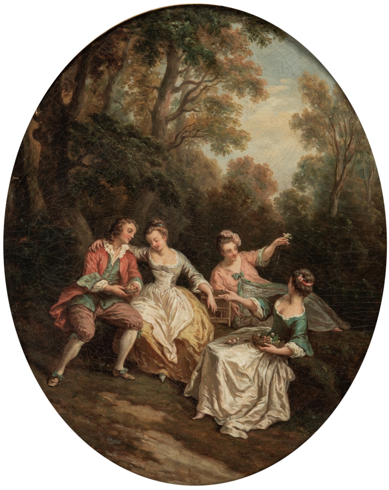 Attributed to Nicolas Lancret: Fête GalanteOil on canvas, oval 18 1/8 x 15 inches (46 x 38.2 cm)Frame 24 1/4 x 21 1/4 inches (61.5 x 54 cm) Glue relined. Craquelure. Repaired 1-inch-long tear just above the heard of