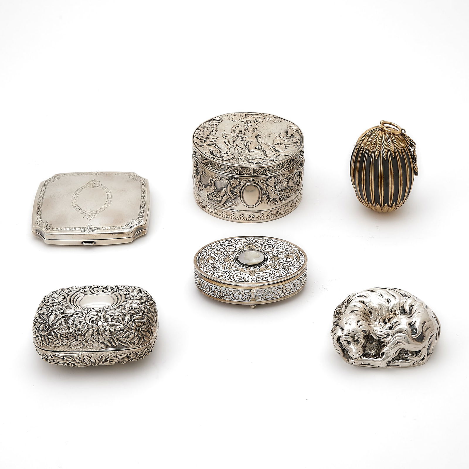 Group of Six Silver, Silver Plate and Other Metals Boxes: Comprising a Bailey, Banks & Biddle soap box, length 3 3/8 inches (8.5 cm); American oval example with mother-of-pearl portrait medallion to cover, length 3 1/2 inches (9 cm); Gorham watch case,