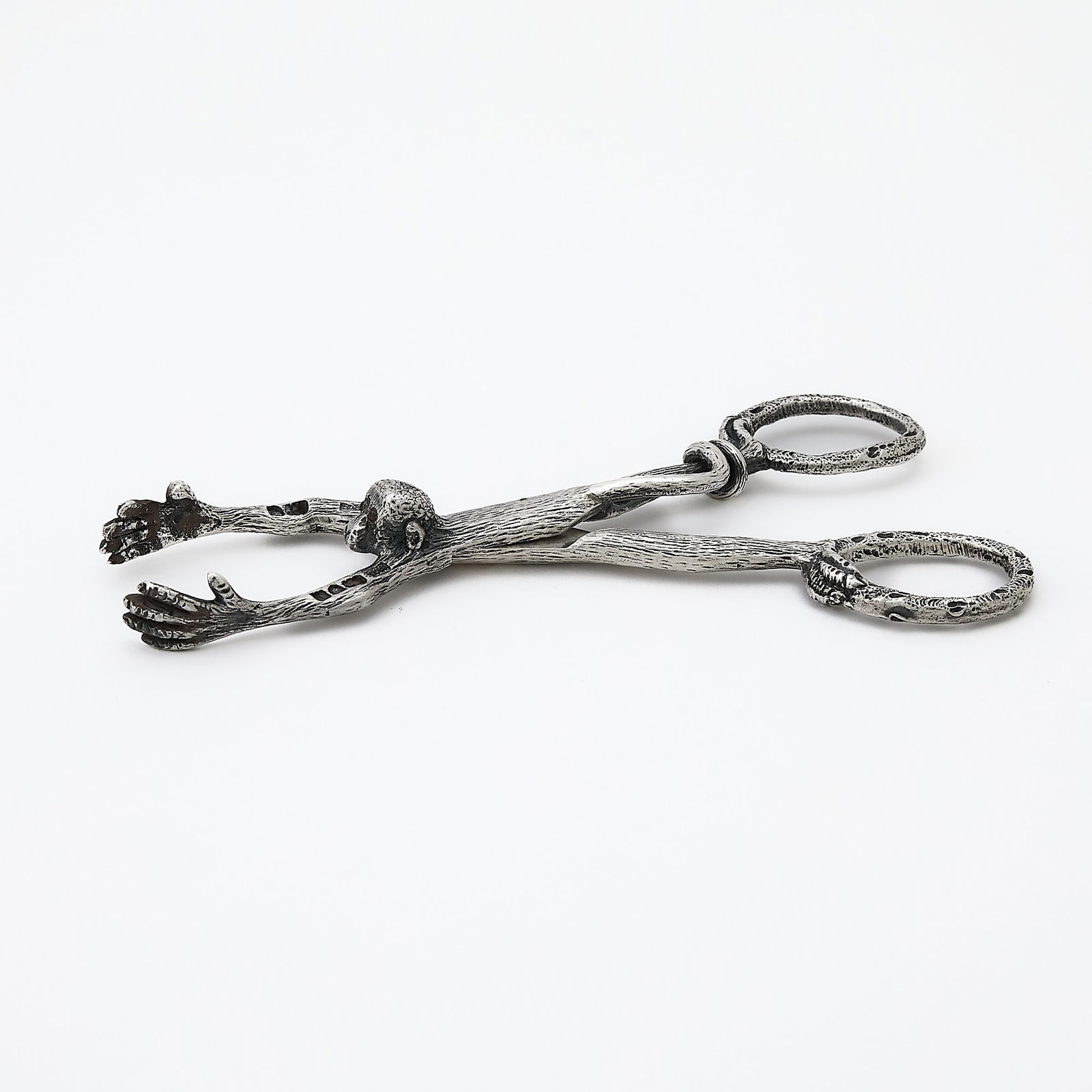 Victorian Sterling Silver Novelty Monkey-Form Sugar Tongs: Charles Fox & Co., London, 1900 Length 5 inches (12.7 cm), approximately 2 ounces. Generally good condition overall