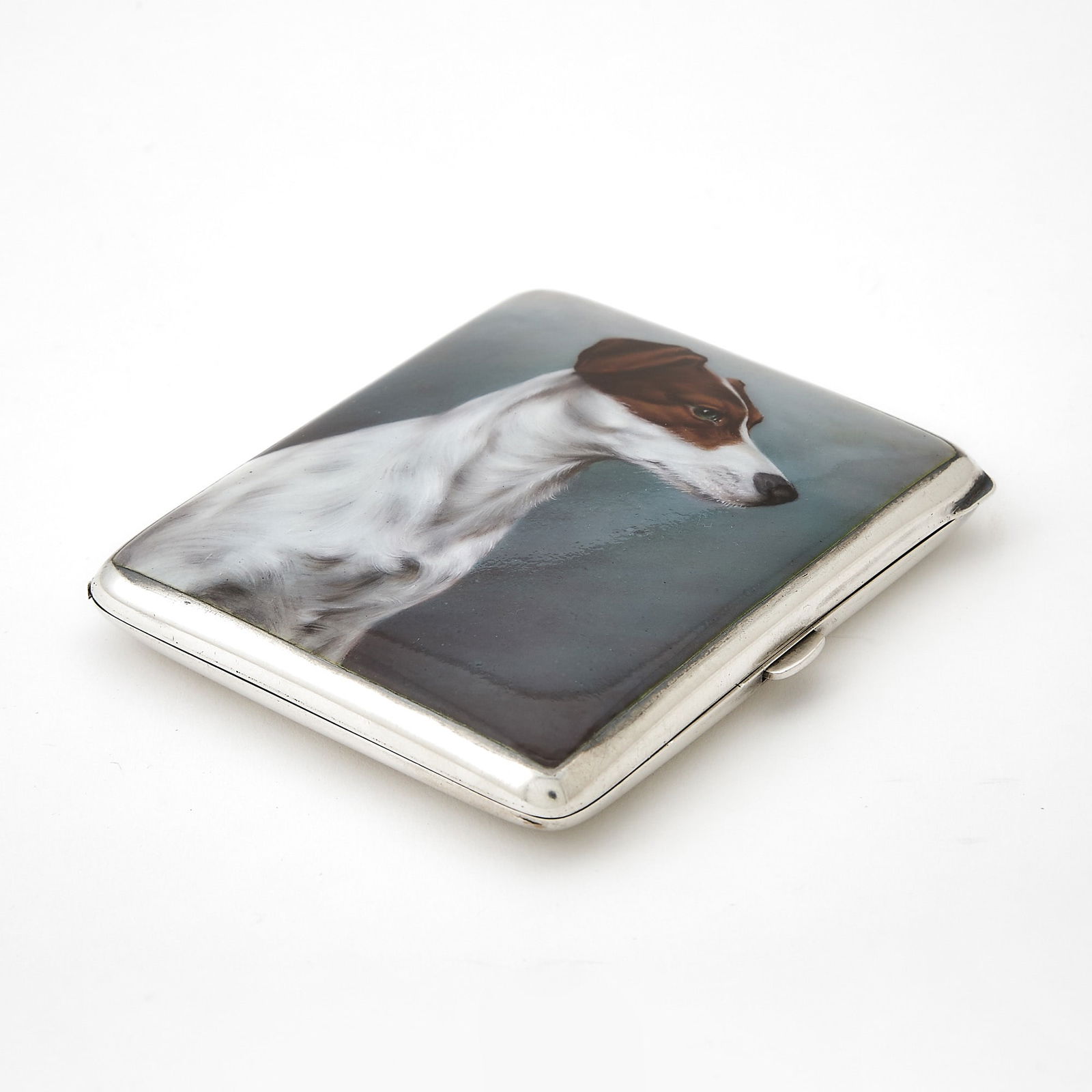 Continental Silver and Enamel Novelty Cigarette Case with Terrier: Netherlands, mid 20th century The rectangular hinged cover with portrait of a terrier. Height 3 5/8 inches (9 cm), approximately 4 ounces, all in. Generally good condition overall