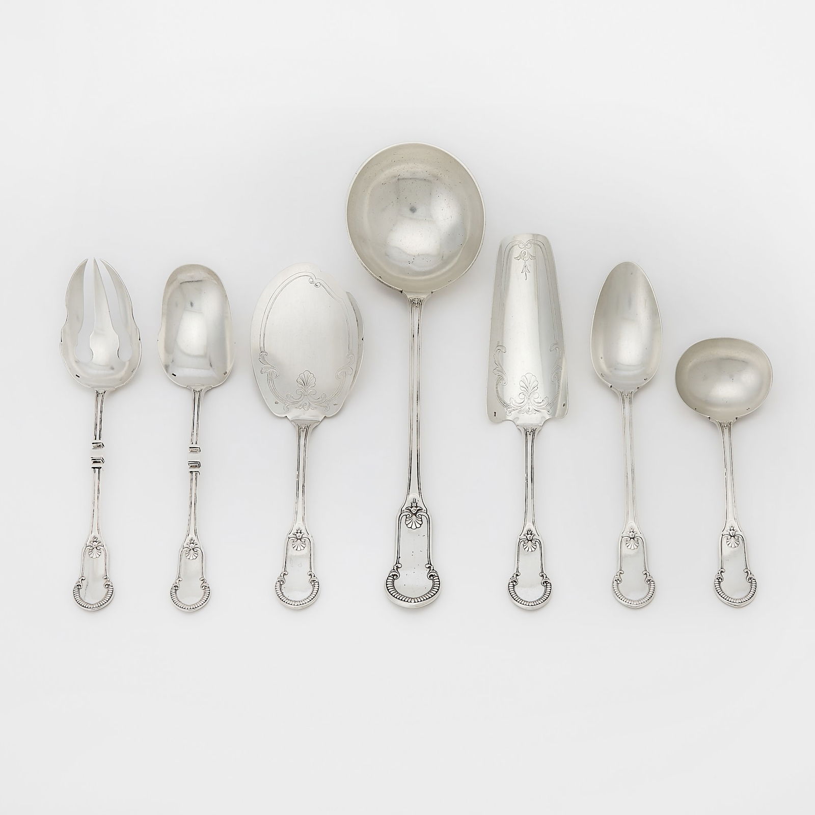 Silver Set: 20th Century Comprising: Nine dinner forksTwelve lunch forksTwelve fish forksTwelve cocktail forksTen dinner knivesTwelve fish knivesFifteen fruit knivesNine tablespoonsEleven dessert