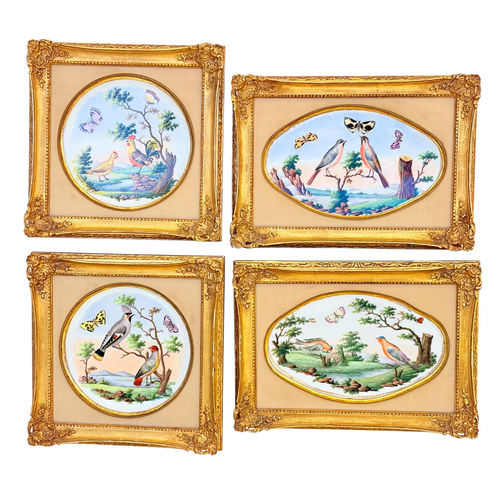Two Pairs of Sevres Gilt and Hand-Painted Porcelain Plates: France, possibly 18th century Mounted in frames and decorated with birds and butterflies. Length of oval plates 9 1/2 inches. 
