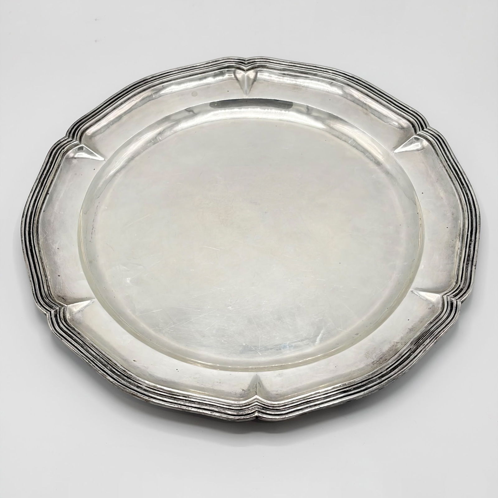Mexican Sterling Silver Tray: Sanborns, mid 20th centuryShaped circular with a reeded border. Diameter 16 inches, approximately 45 ounces.