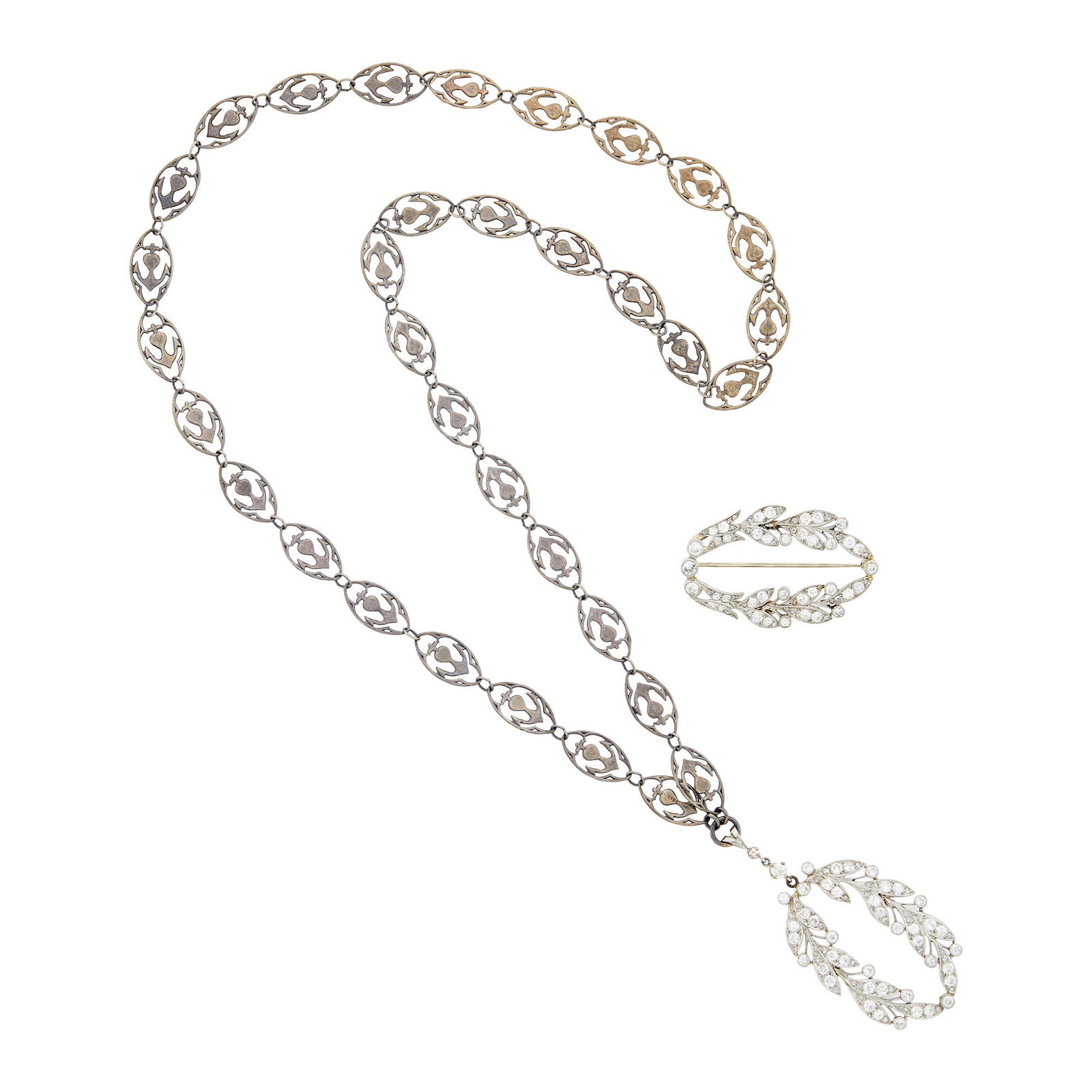 Platinum and Diamond Brooch and Pendant with Silver Link Necklace: 152 transitional and rose-cut diamonds ap. 6.60 cts., ap. 21.7 dwts. Length 25 inches. Brooch and pendant tests for platinum. Pin clasp tests for 10 kt. white gold.Diamonds: I-J-SI-IPendant 2 3/8 x