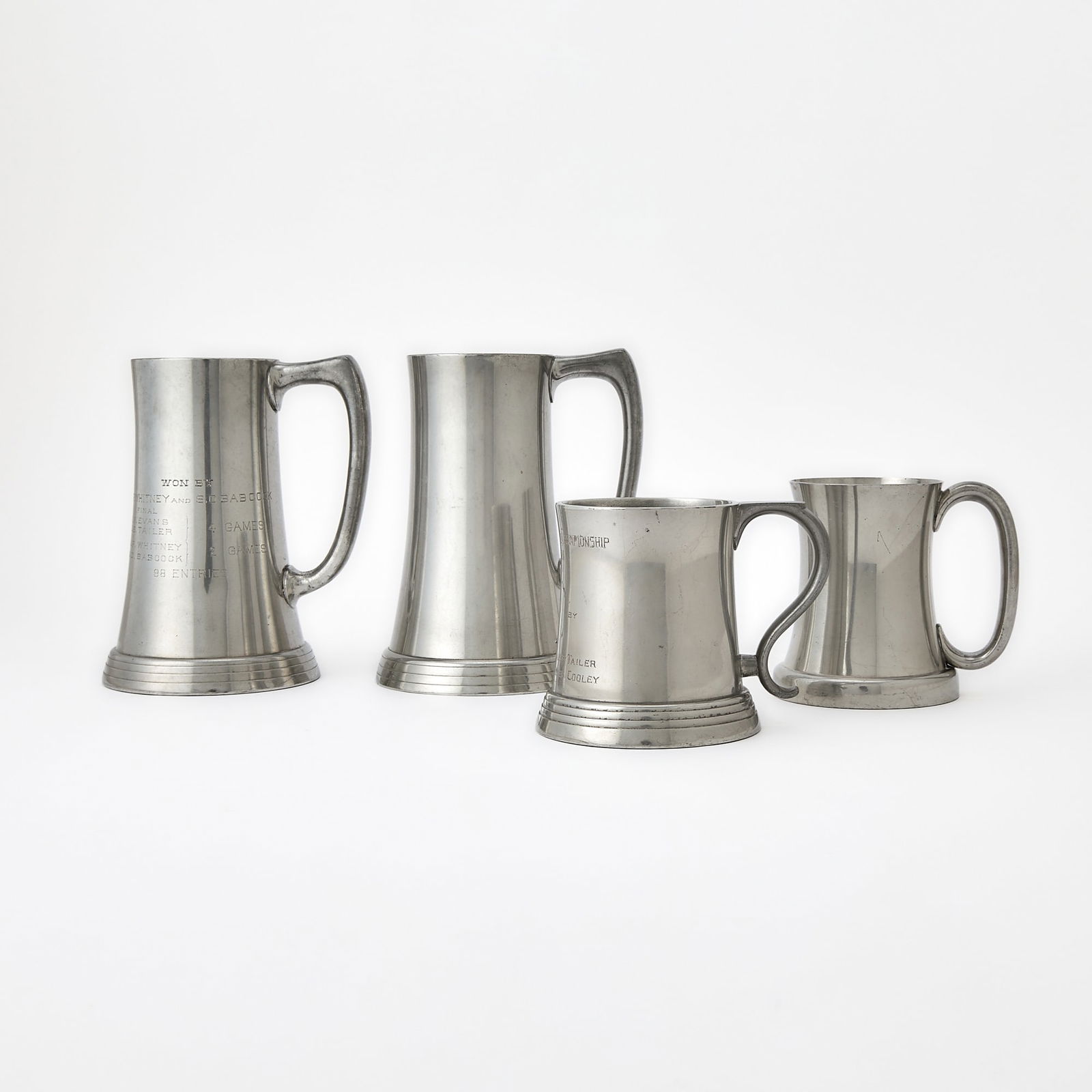 Group of Four Pewter Bridge and Polo Trophies (1 of 9)