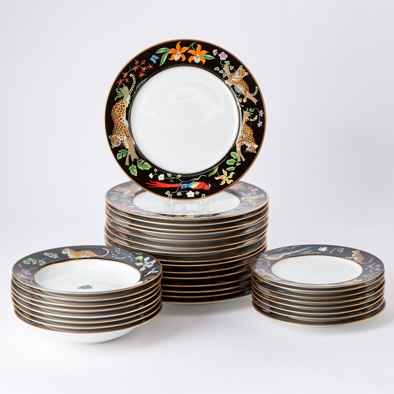 Lynn Chase Porcelain "Jaguar Jungle" Pattern Partial Dinner Service: Modern Comprising: Sixteen dinner plates, diameter 11 inches Eight rim soup plates Eight salad/dessert plates, diameter inches (32)