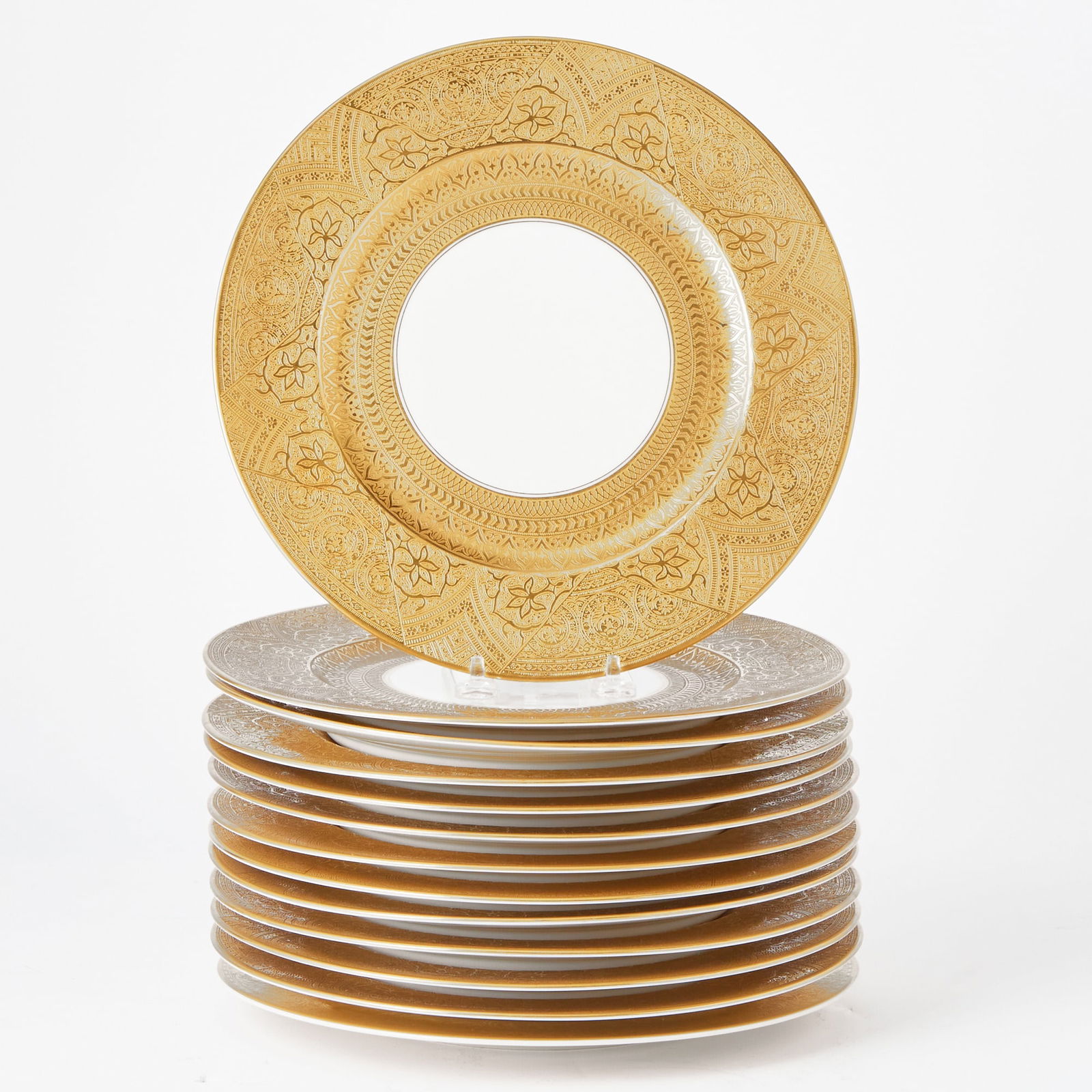 Set of Thirteen Heinrich & Co. Gilt Decorated Porcelain Dinner Plates: Made in Bavaria. Diameter 10 3/4 inches. Qty: (13)