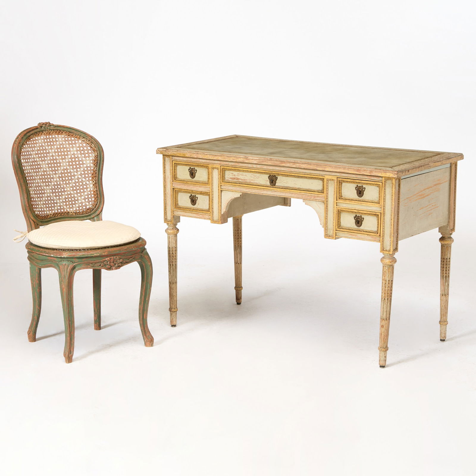 Louis XVI Style Leather Inset Painted Wood Desk and Side Chair: 20th Century Height of desk 29 3/4 inches, width 43 1/2 inches, depth 21 1/2 inches; height of chair 34 inches, width 18 inches, depth 15 1/2 inches.