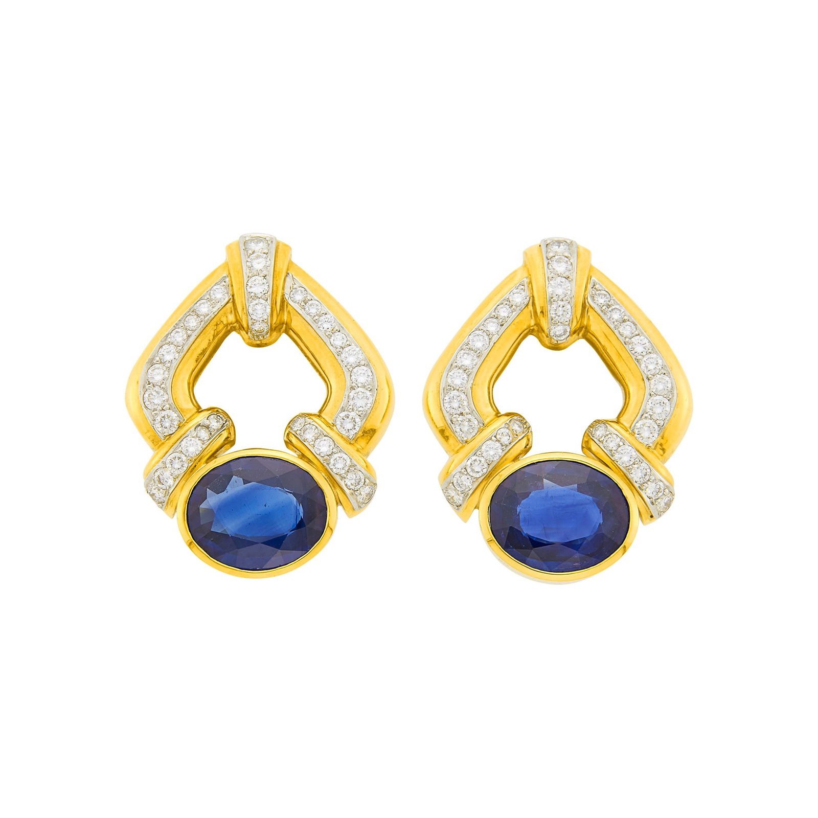 Andrew Clunn Pair of Gold, Platinum, Sapphire and Diamond Earclips: 18 kt., 2 oval sapphires ap. 9.00 cts., 64 round diamonds ap. 3.00 cts., signed A. Clunn, ap. 20.2 dwts. Sapphires: deep blue, hexagonal zoning, not easily visible, lively. Diamonds: G-H-I-VS. Clip-ba