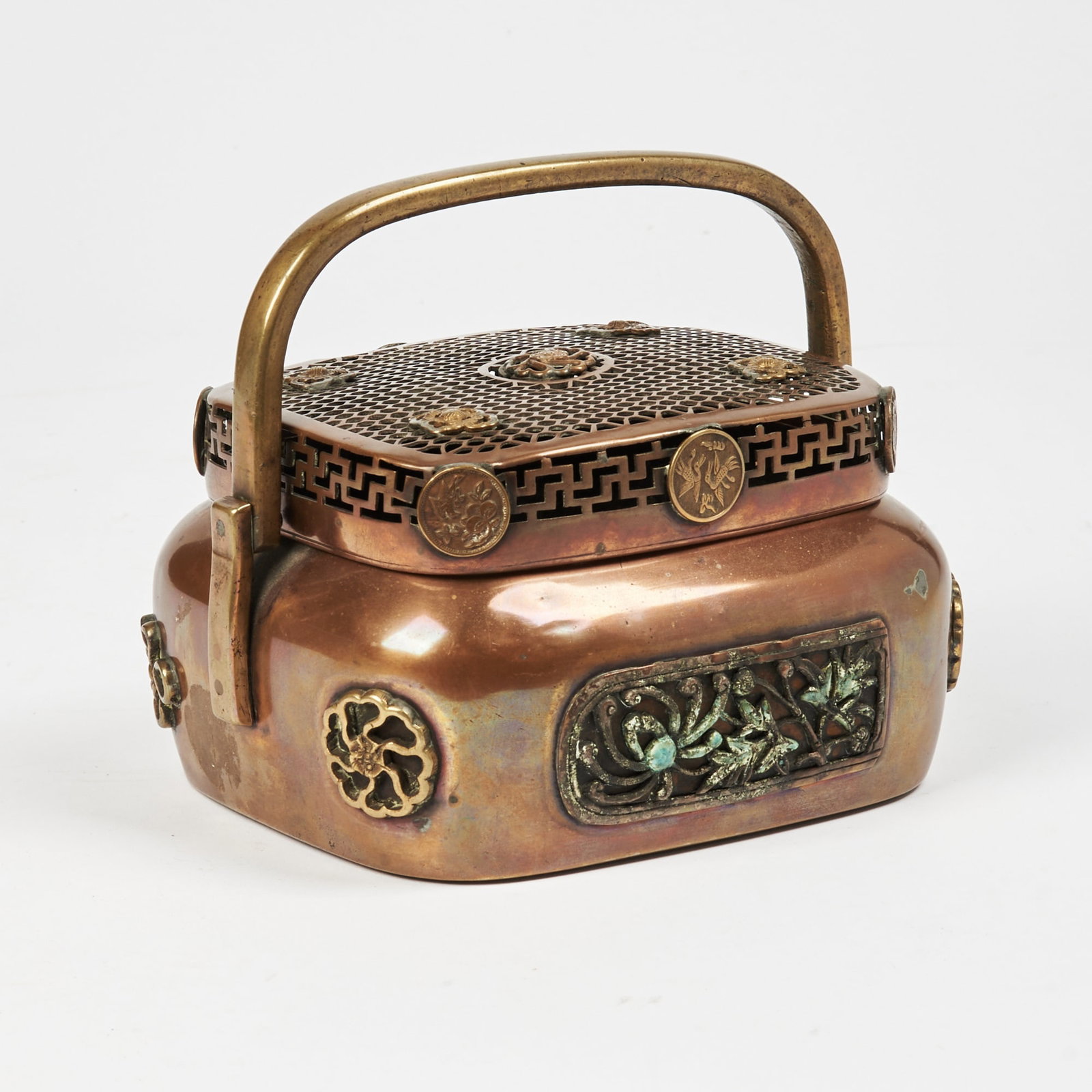 A Chinese Copper Rectangular Hand Warmer with Swing Handle Qing Dynasty: Length 6 3/4 inches