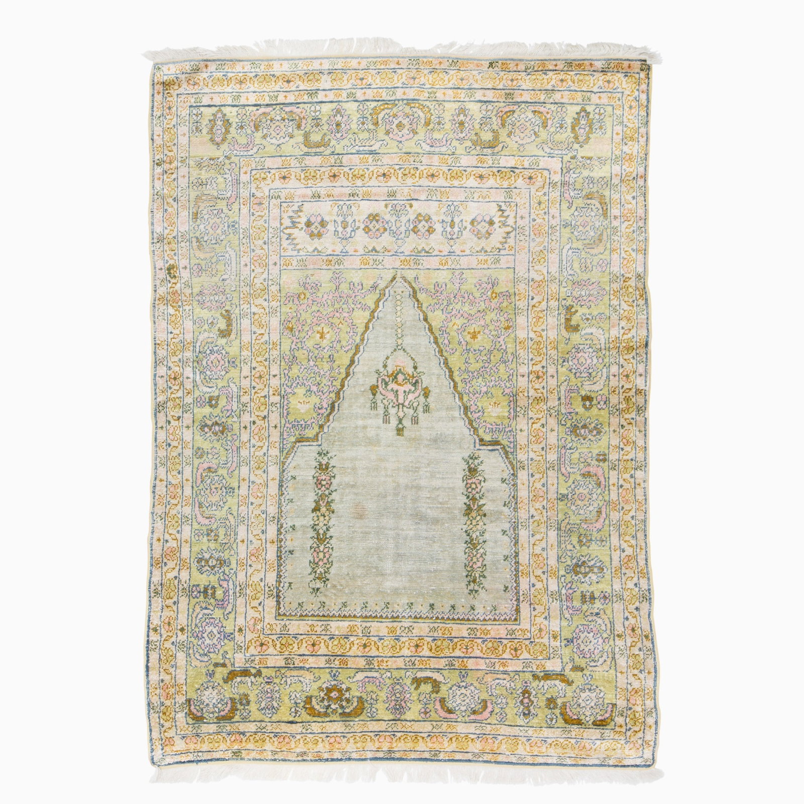 Kayseri Prayer Rug: Central Turkey, 2nd 1/4 20th Century The slate grey field with a hanging lamp beneath a stepped arch and celadon spandrels is within a palmette and curled leaf border. Mercerized cotton pile. (5' 4" x