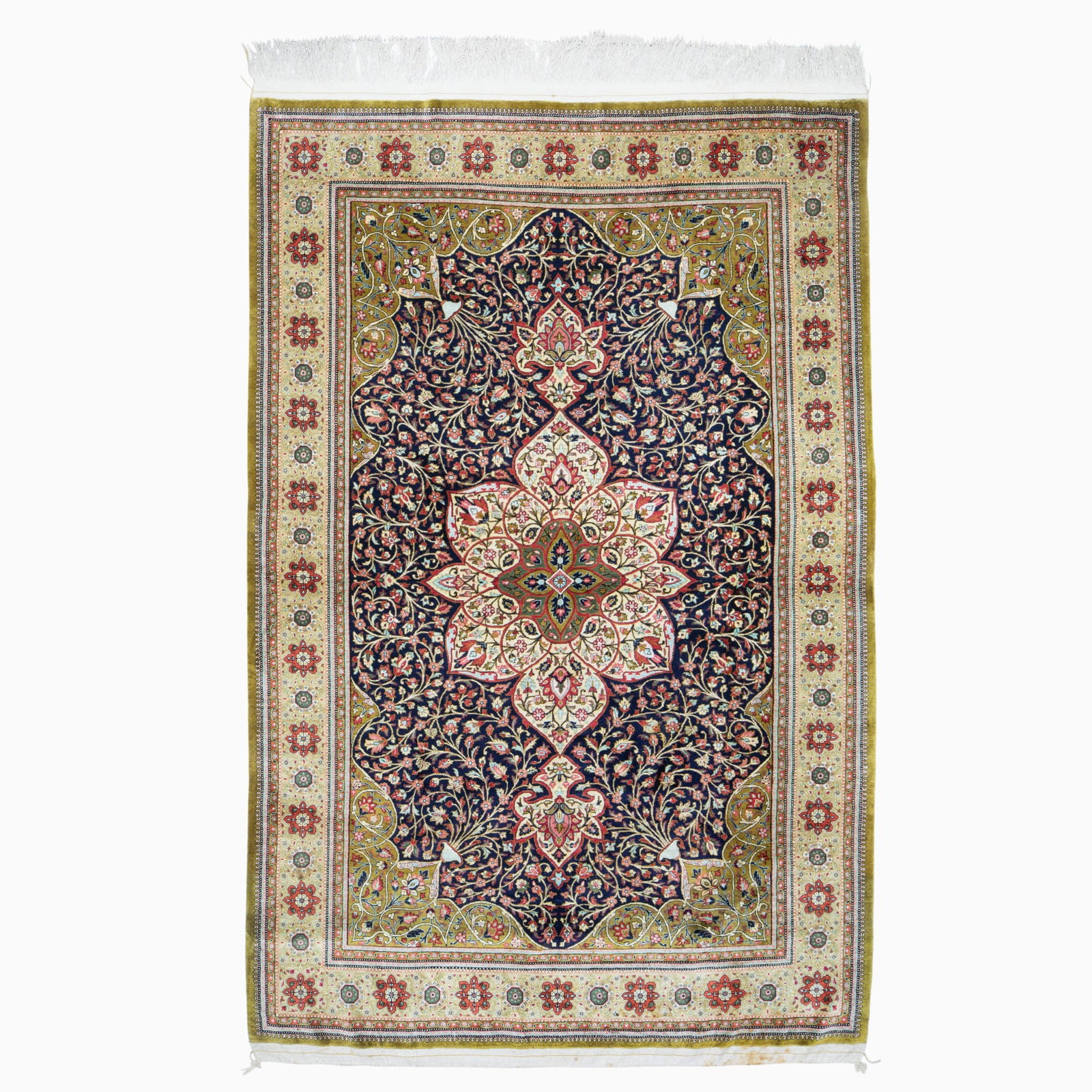 Qum Silk Rug: Central Iran, 2nd 1/2 20th Century The central pendant medallion on the midnight blue field flanked by olive spandrels is within a celadon rosette border. 400 kpsi (6' 11" x 4' 8") Stains on fringe we