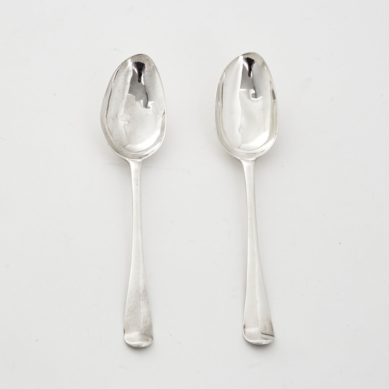 Rare Pair of Charleston Colonial Silver Tablespoons: Thomas You, Charleston, 1753-1786Length 8 inches, total 3 ounces.Thomas You (c. 1730–1786) was a prominent American Colonial silversmith and political activist in Charleston, South Carolina,