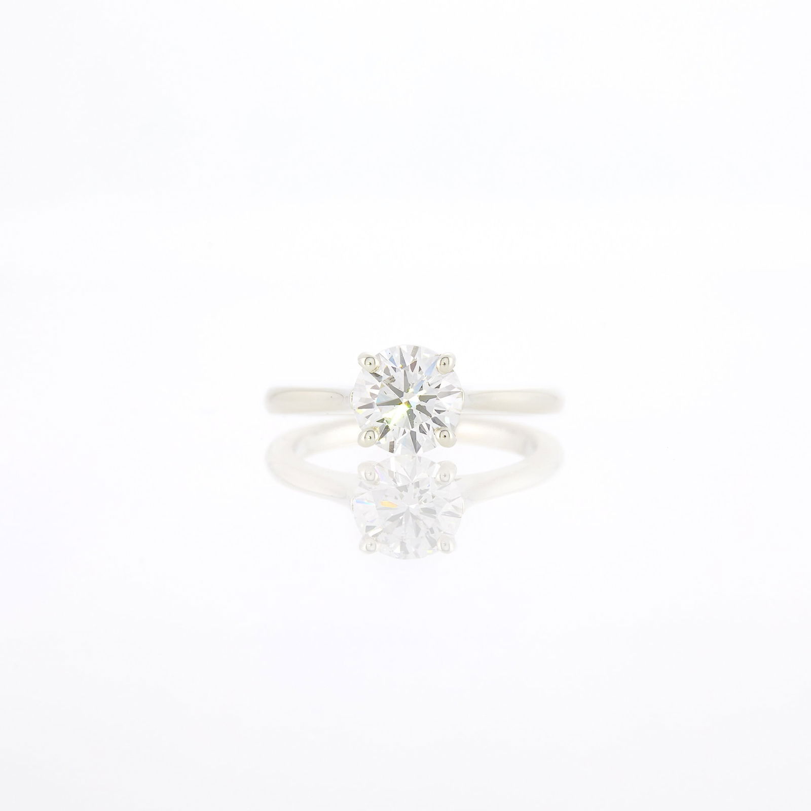 Silver and Diamond Ring: One round diamond weighing 1.39 cts. Size 6.With GIA report no. 2231863065 stating D color, SI1 clarity. Diamond: D-SI1, no fluorescence