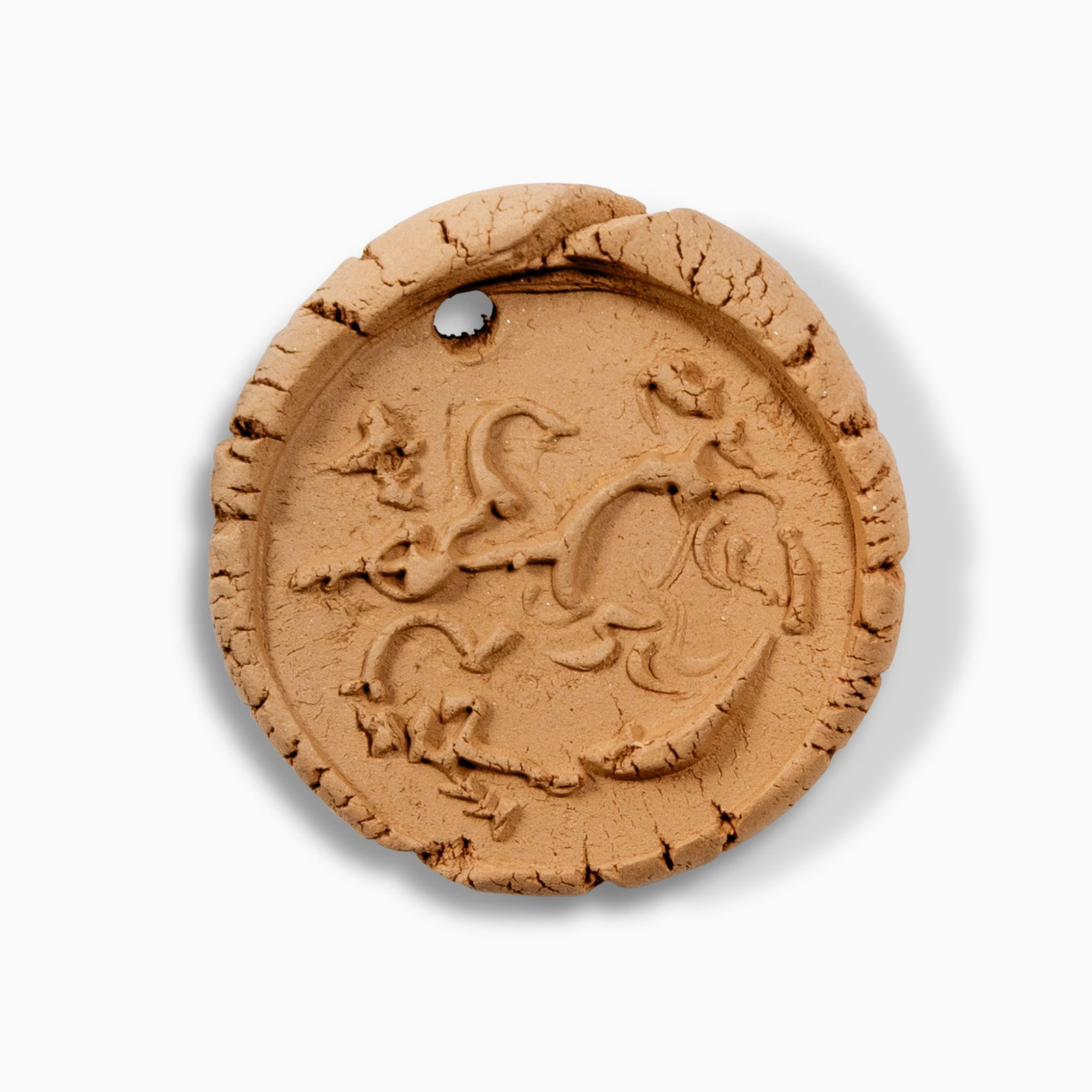 Pablo Picasso (1881-1973): PICADOR ET TAUREAU (ALAIN RAMIÉ 93) Red ceramic medallion, 1949, from the edition of 60, with Madoura Empreinte Originale de Picasso pottery stamp on the reverse. 1 3/8 x 1 5/16 inches (3.4 x