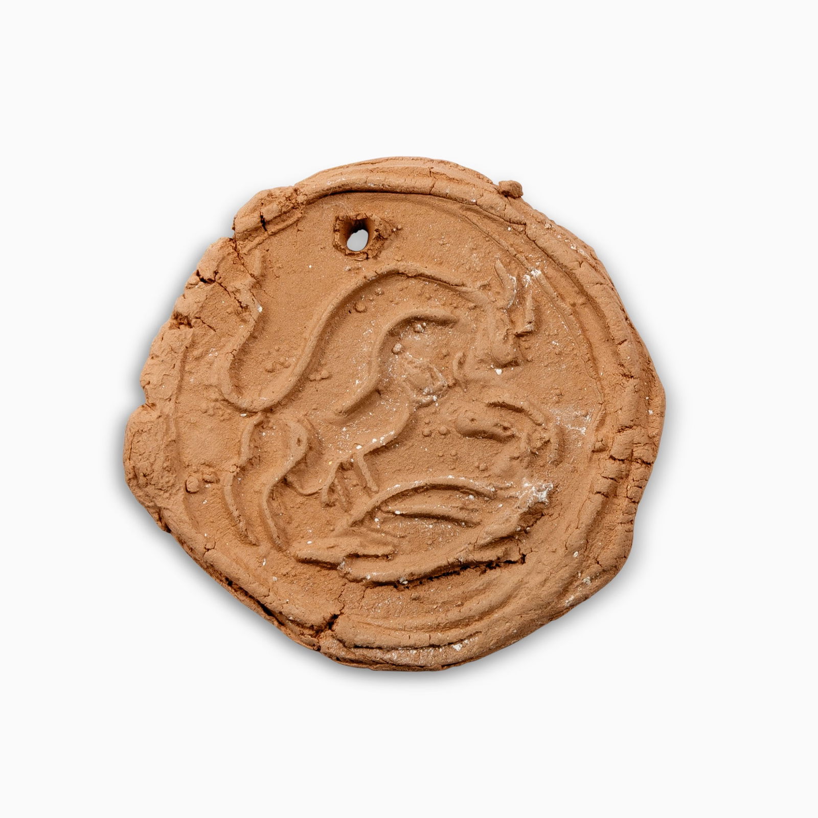 Pablo Picasso (1881-1973): TAUREAU ATTAQUANT (ALAIN RAMIÉ 94) Red ceramic medallion, 1949, from the edition of 60, with Madoura Empreinte Originale de Picasso pottery stamp on the reverse. 2 x 2 inches; 51 x 51 mm.