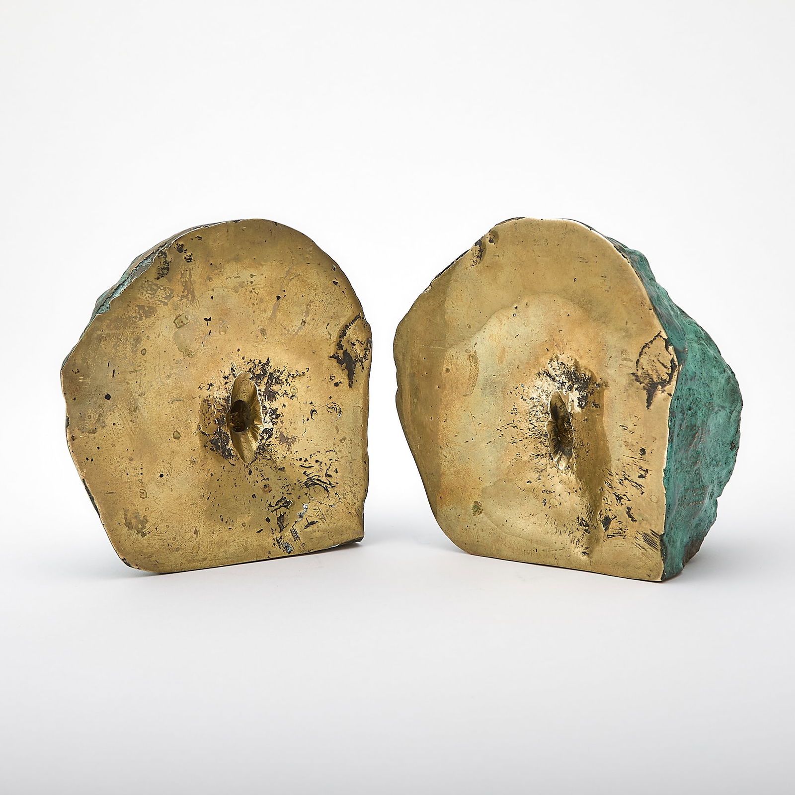 Lucio Fontana: Italian-Argentinian, 1899-1968 Concetto spaziale, Natura Each part signed L. Fontana on the bottom Bronze with gold and green patina Each 3 3/4 x 2 x 4 1/4 inches (9.5 x 5.1 x 10.8 cm) Provenance: