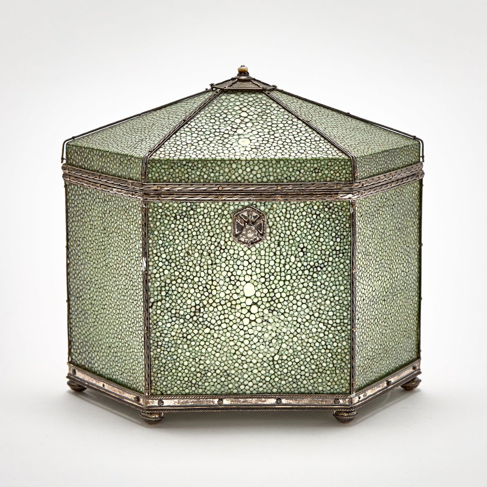 John Paul Cooper Arts and Crafts Shagreen and Silver Tea Caddy: John Paul Cooper (3 October 1869– 3 May 1933) was a British architect and a leading craftsman in the Arts and Crafts Movement. First quarter 20th century Of hexagonal form, with a hinged cover,