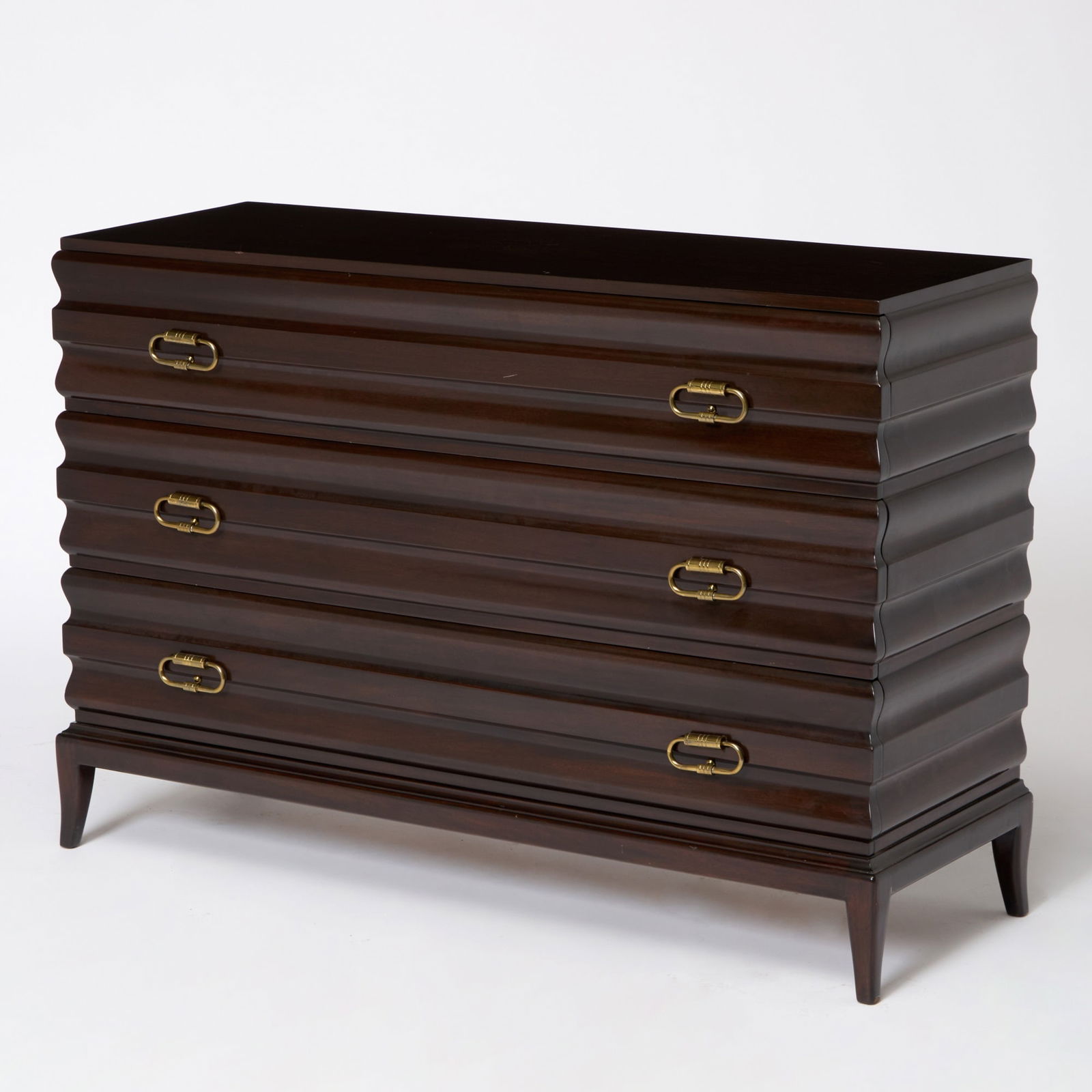 Tommi Parzinger Walnut Chest of Drawers: Mid 20th century Height 30 inches, width 46 1/4 inches, depth 16 1/4 inches.