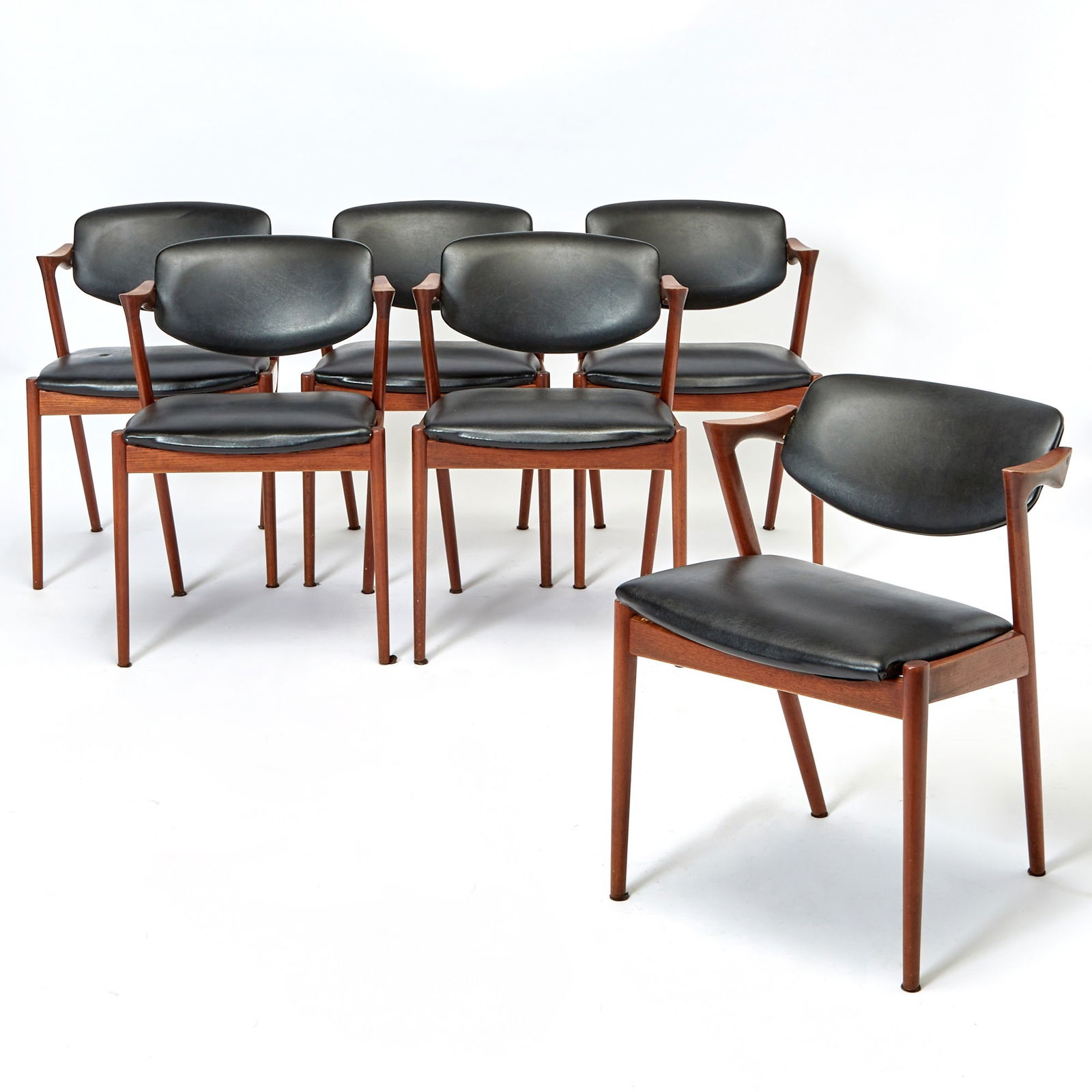Set of Six Upholstered Walnut Dining Armchairs: Mid 20th century Height of back 31 inches, height of seat 19 inches, width 23 inches, depth 24 inches.
