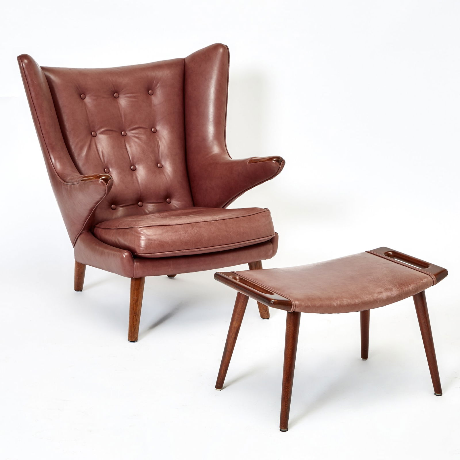 Hans Wegner For Johannes Hansen "Papa Bear" Lounge Chair and Ottoman: Second half 20th century Height of back 38 1/2 inches, height of seat 18 inches, width 36 inches, depth 29 inches; height of ottoman 16 1/2 inches, length 28 inches, depth 16 inches.