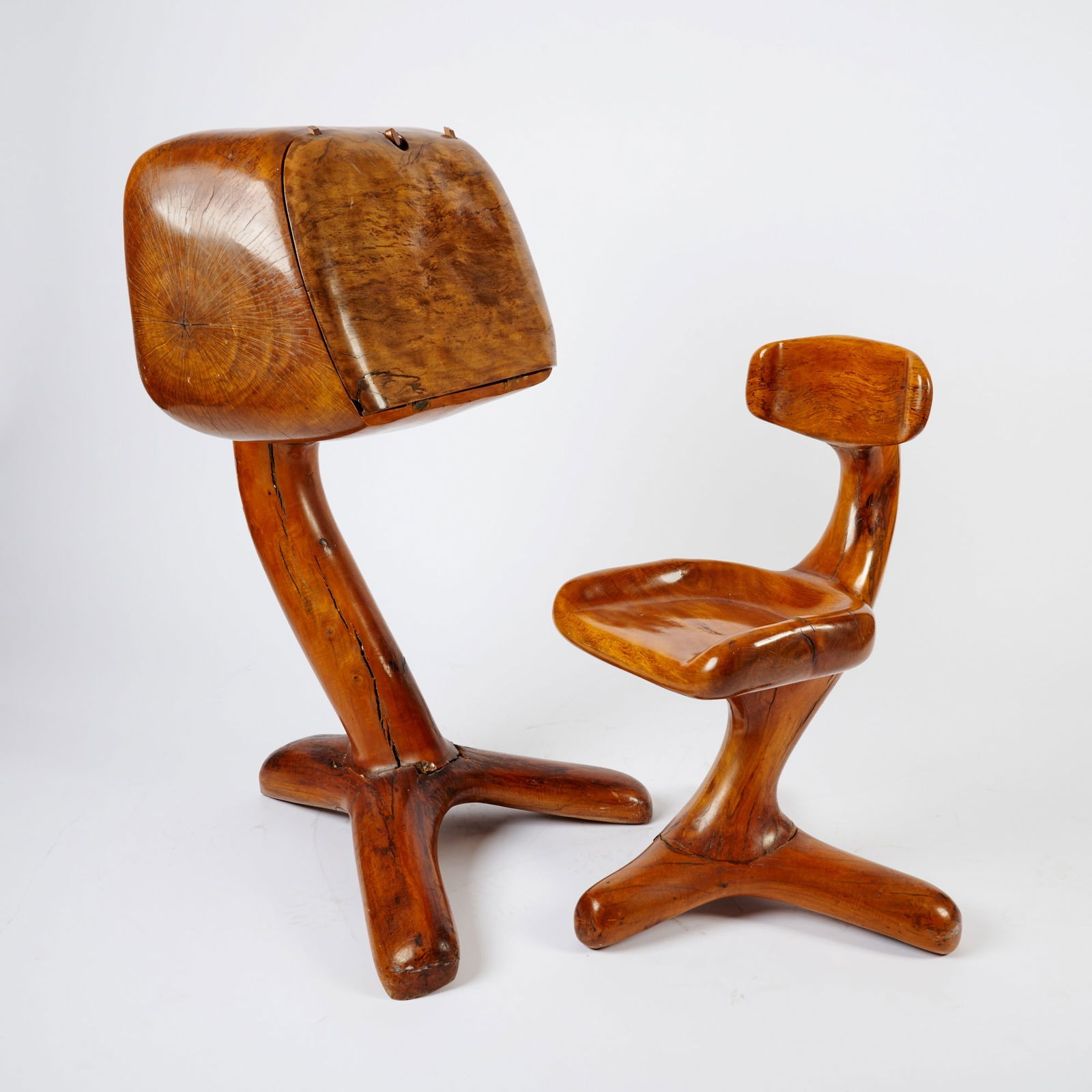 Arthur Espenet Carpenter Desk and Chair: Second half 20th century Height of desk 40 inches, width of base 24 inches, depth 24 inches.