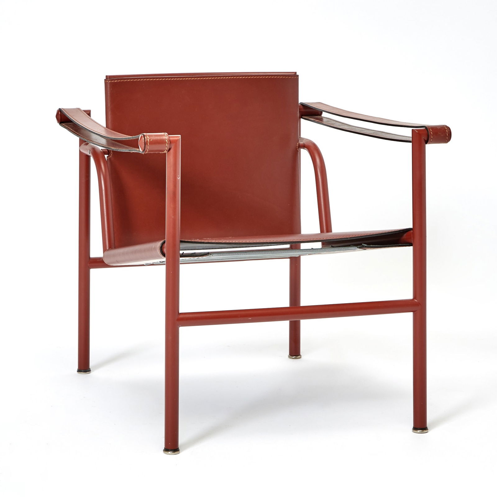 Le Corbusier Tubular Metal and Leather "LC1" Sling Chair: Recent manufacture Height of back 26 inches, height of seat 16 inches, width 23 inches, depth 25 inches.