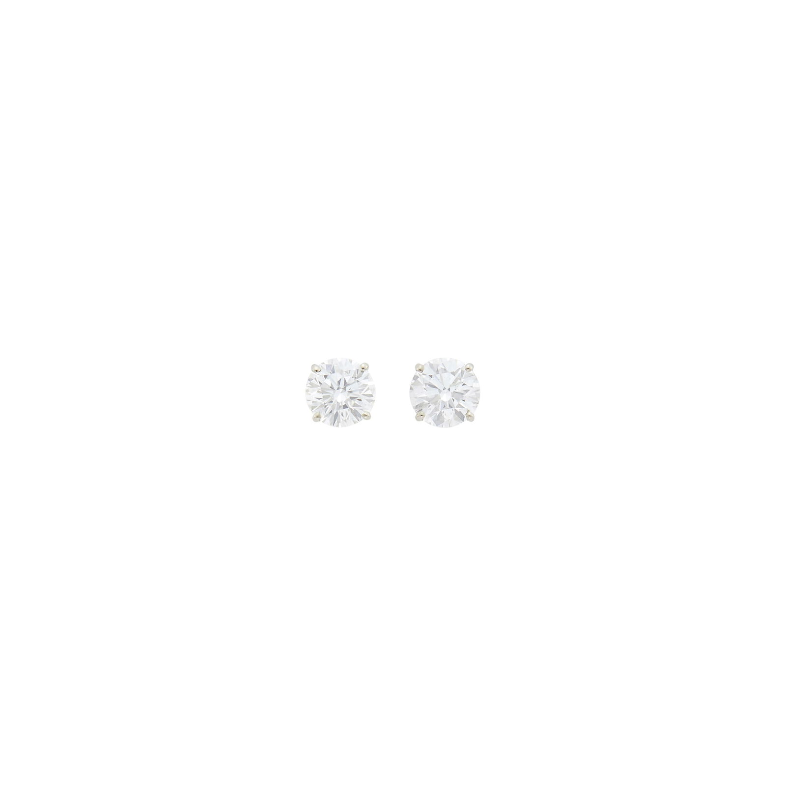 Pair of White Gold and Diamond Stud Earrings: 2 round diamonds weighing 2.40 cts.With GIA report no. 2235838233 stating 1.20 cts., F color, VS1 clarity. With GIA report no. 2235851780 stating 1.20 cts., E color, SI1 clarity. Diamond: F-VS1, no