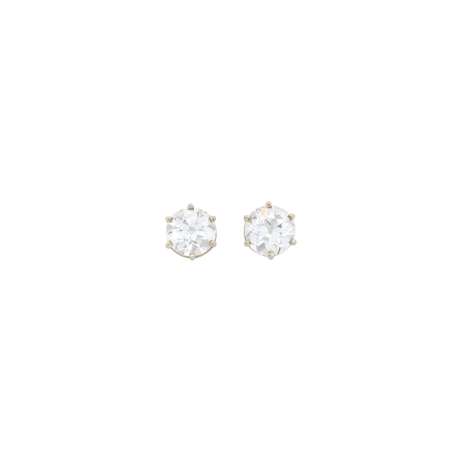 Pair of White Gold and Diamond Stud Earrings: 14 kt., 2 old European-cut diamonds weighing 4.03 cts.The diamonds have been weighed. Diamonds: 1.89 and 2.14 cts., I-J-SI2, larger stone out-of-round, large open culets, 1,89 cts. diamond with