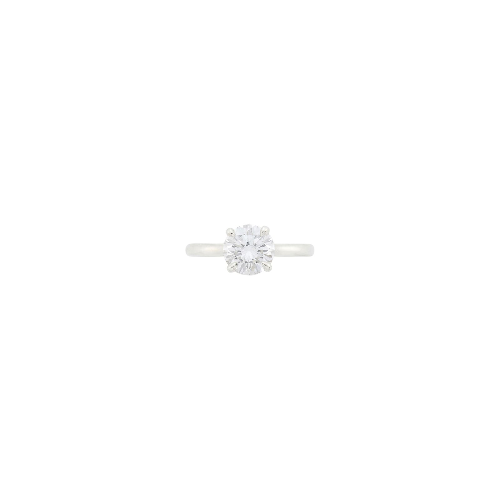 Silver and Diamond Ring: One round diamond weighing 1.71 cts. Size 5 3/4.With GIA report no. 5231797531 stating F color, VS1 clarity. Diamond: F-VS1, no fluorescence, very good cut, excellent polish and symmetry.