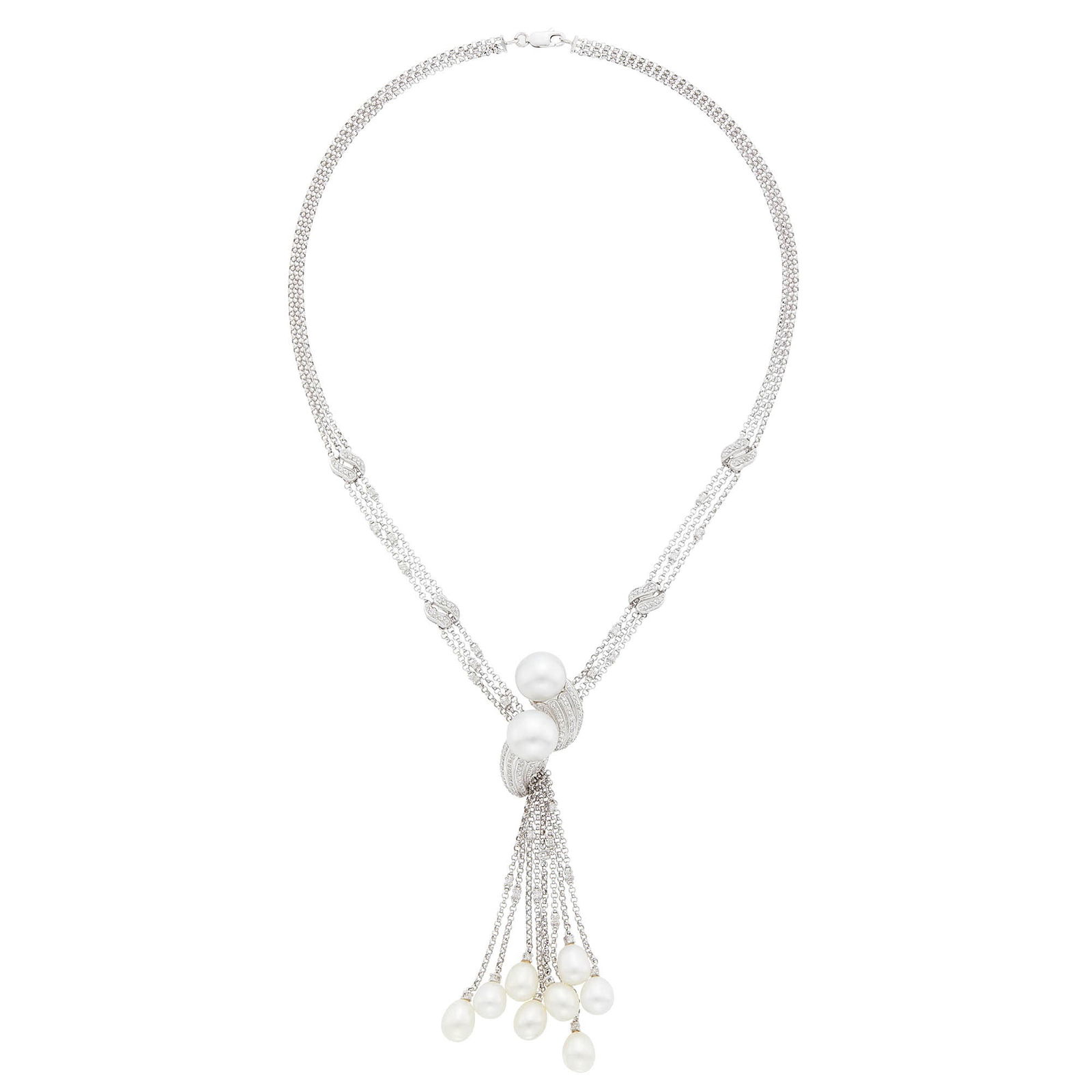 Triple Strand White Gold, South Sea and Freshwater Cultured Pearl and Diamond Sautoir: 18 kt., 2 pearls ap. 12.2 mm., small round diamonds, 8 vari-shaped drop-shaped freshwater pearls, ap. 24.2 dwts. gross. Length 17 1/2 inches. South Sea pearls: slightly silvery white with rose and