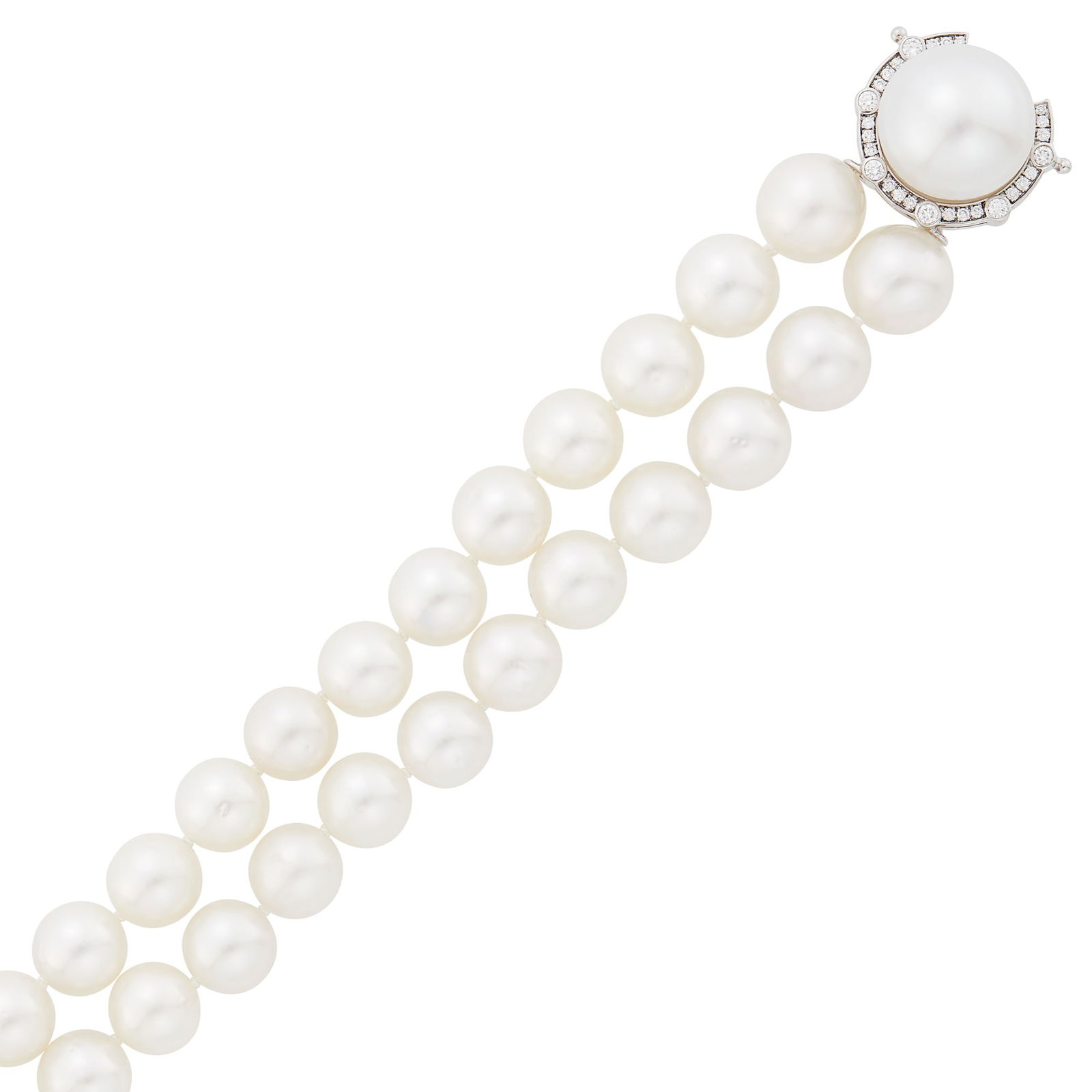Double Strand Cultured and South Sea Cultured Pearl Bracelet with White Gold and Diamond Clasp: 18 kt., 36 pearls ap. 10.4 to 9.0 mm., one South Sea button pearl ap. 14.8 mm., 32 round diamonds ap. .35 ct., signed Aurore. Length 6 1/2 inches. Pearls: white with rose and green orient,