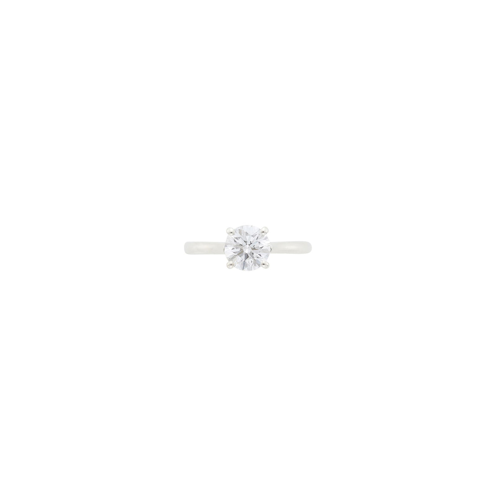 Silver and Diamond Ring: One round diamond weighing 1.38 cts. Size 6. With GIA report no. 2235851769 stating D color, VS2 clarity. Diamond: D-VS2, faint fluorescence.