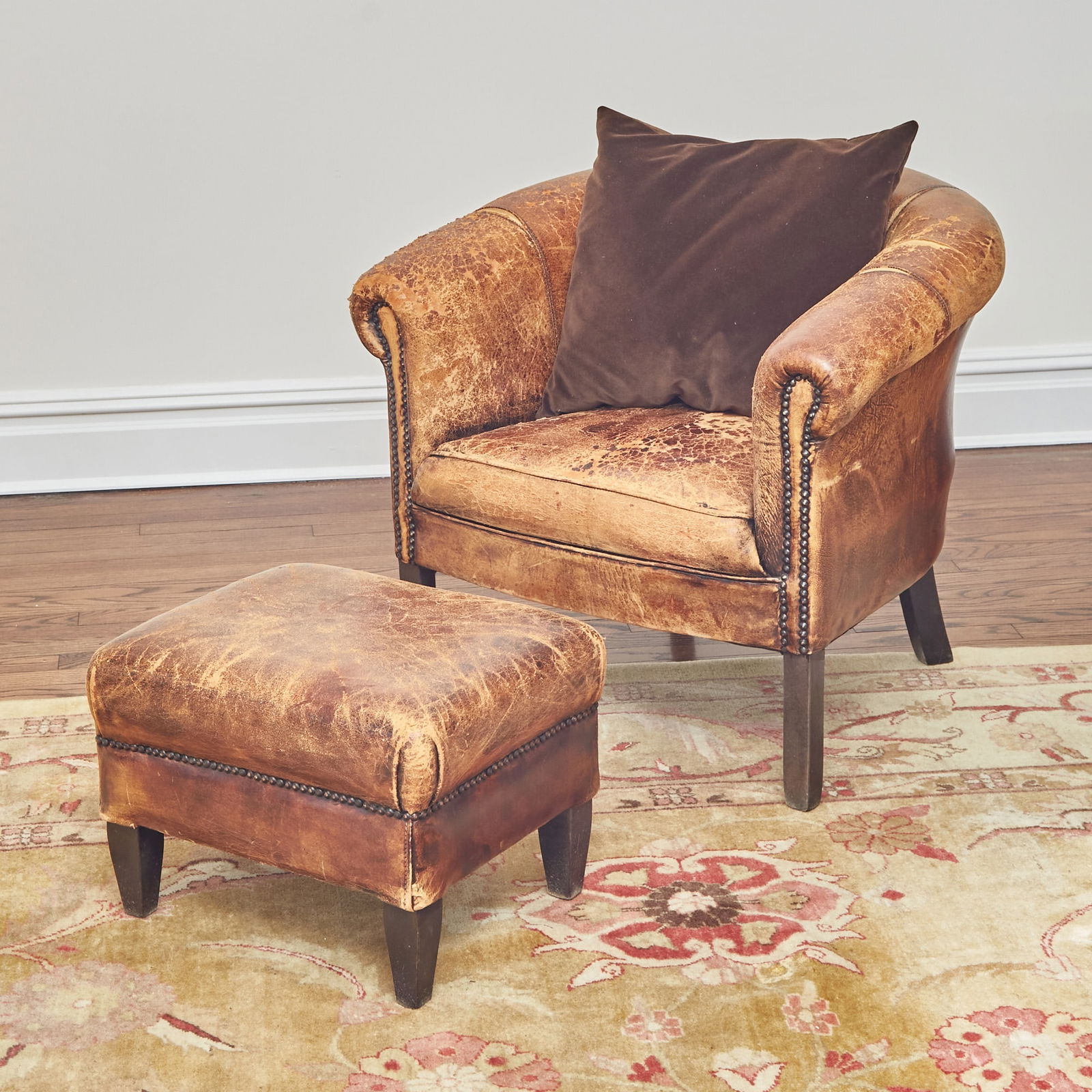 Distressed Leather Upholstered Club Chair and Ottoman (1 of 3)