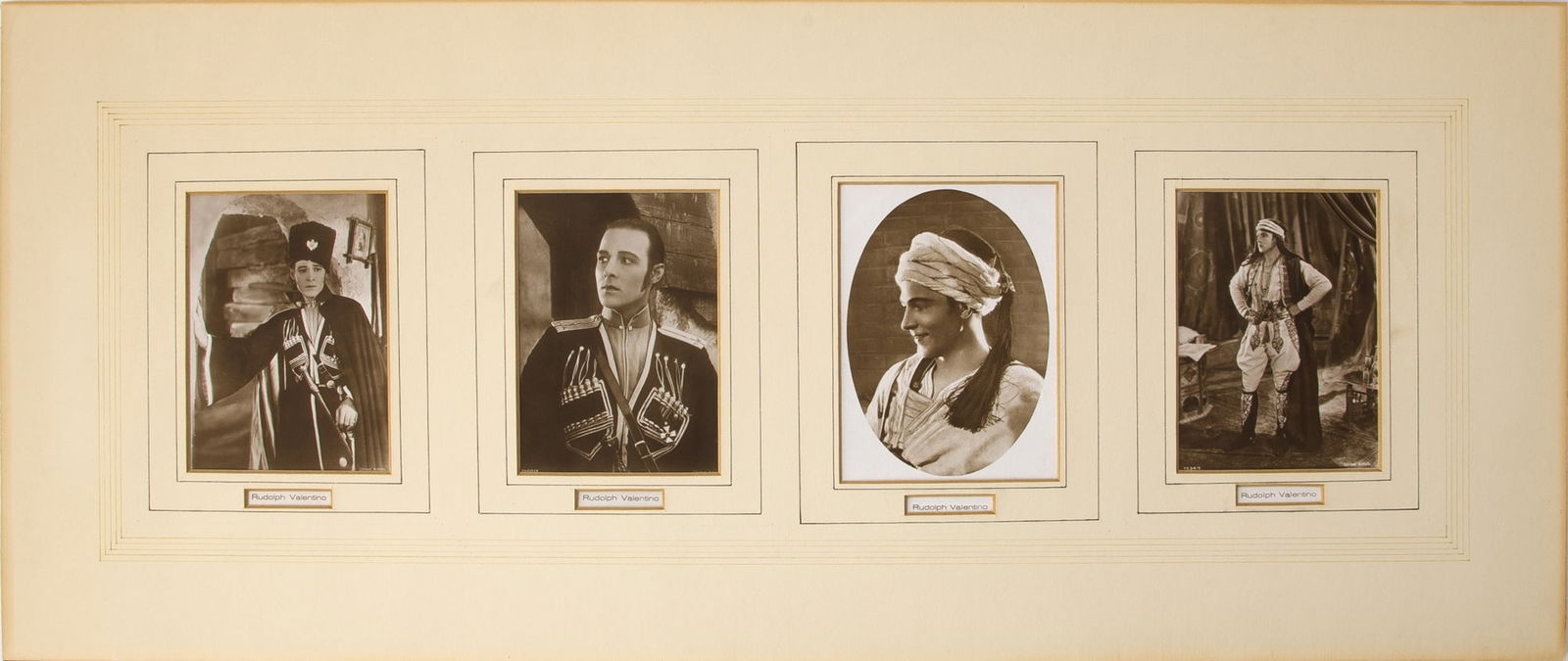 Four Press Photos of Rudolph Valentino: RUDOLPH VALENTINOFour press photographs of Rudolph Valentino in character as the Black Eagle from The Eagle and as the titular Son of the Sheik. Each photogaph 3 x 4 1/4 inches (7 1/2 x 10 cm.) All