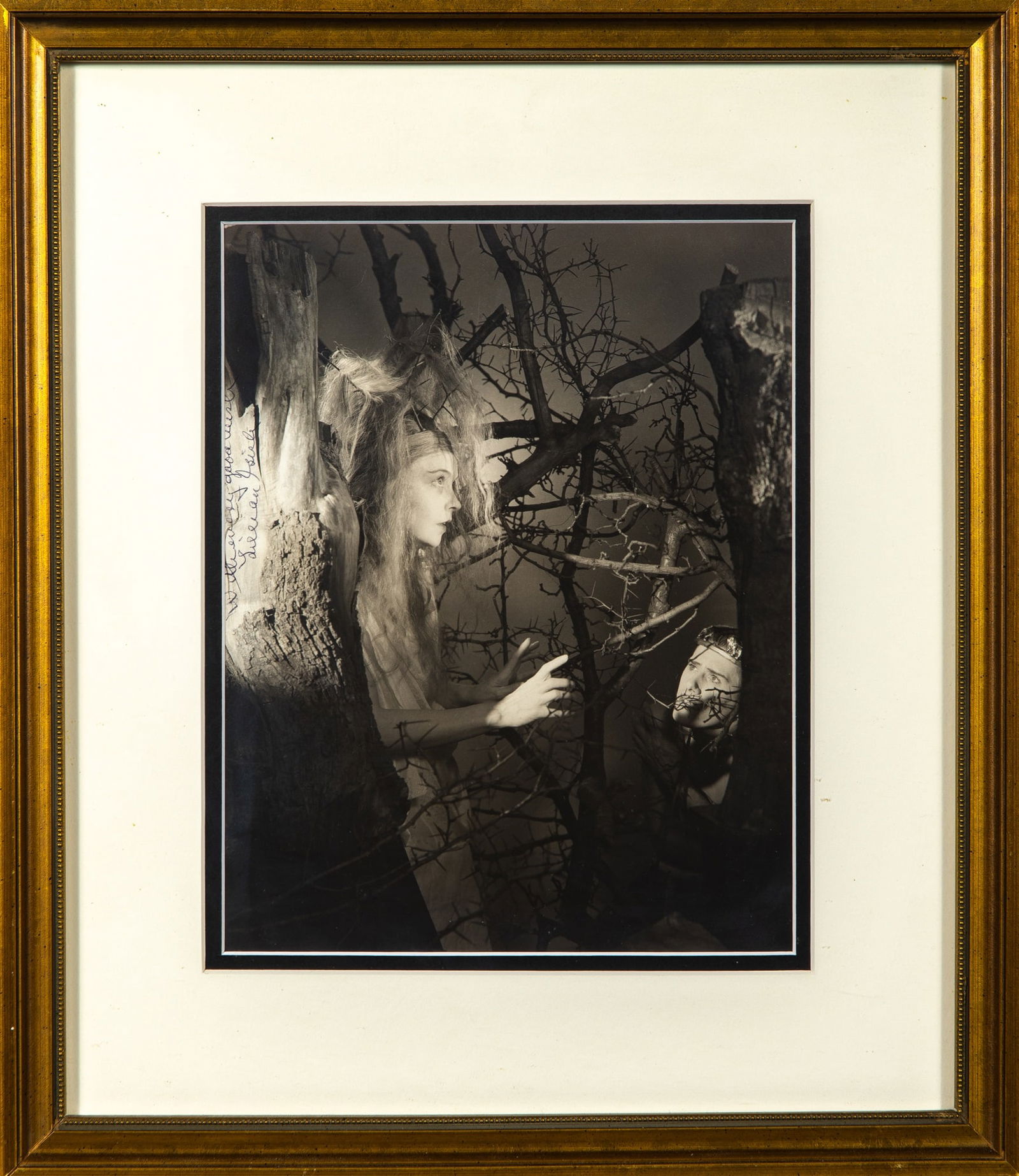 A fabulous signed photograph of Lillian Gish as Egeria: LILLIAN GISH A fabulous signed photograph of Lillian Gish as Egeria. Photograph by George Platt Lynes, circa 1943. Gelatin silver print. Signed by Gish on left margin: "With every good wish / Lillian