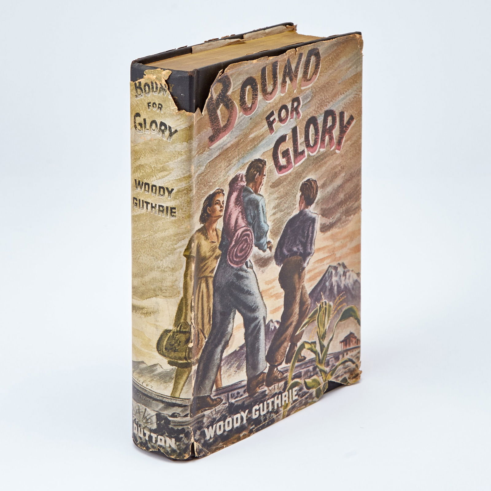 First edition of Woody Guthrie's Bound for Glory: GUTHRIE, WOODY Bound for Glory. New York: Dutton, 1943. First edition. Publisher's cloth in original pictorial dust jacket. Portrait frontispiece from a photo by Robin Carson; illustrations from sket