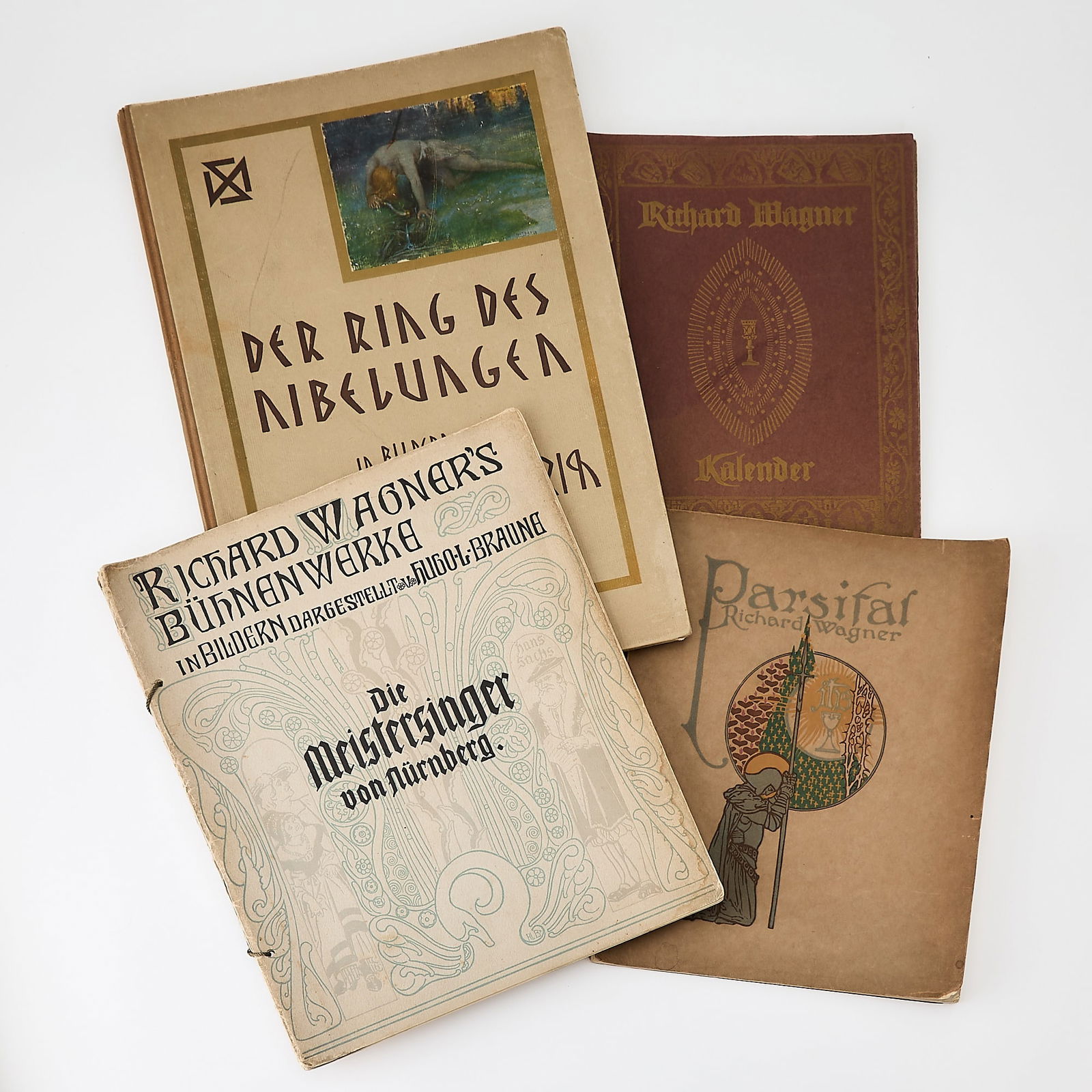 Ten illustrated works on Wagner: WAGNER, RICHARD Approximately ten illustrated works on Wagner. The largest 19 1/2 x 14 1/2 inches (50 x 37). Comprising:[FRANZ STASSEN]. Parsifal: Berlin: B. Behr, [1914]. Housed in publisher's