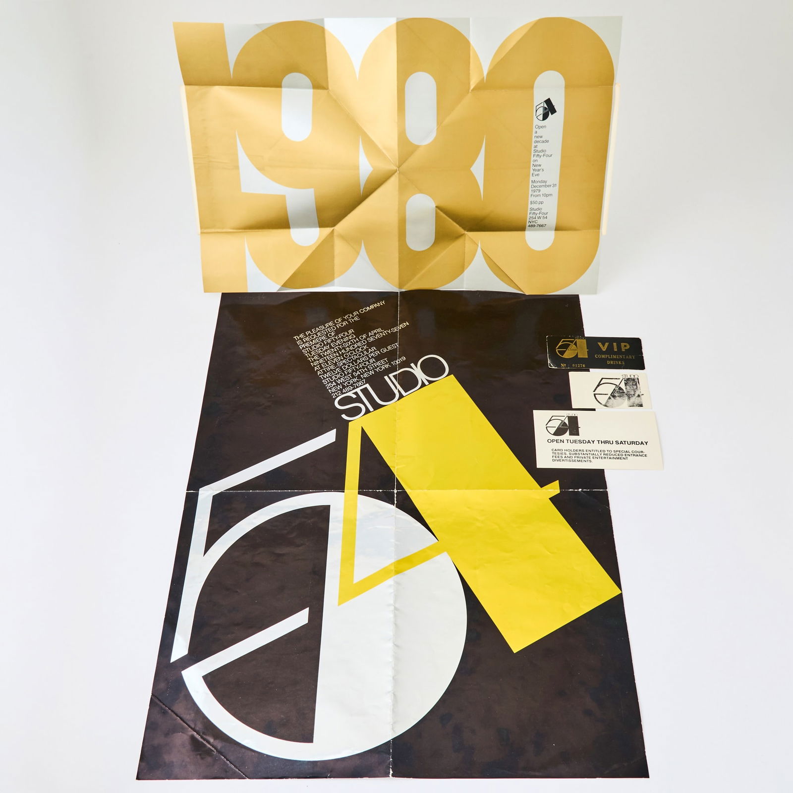 The poster-sized invitation to the opening of Studio 54 with other ephemera: STUDIO 54The poster-sized invitation to the opening of Studio 54 with other ephemera. The opening night invitation to Studio 54 on April 26th, 1977 was mailed to invitees in the form of a large