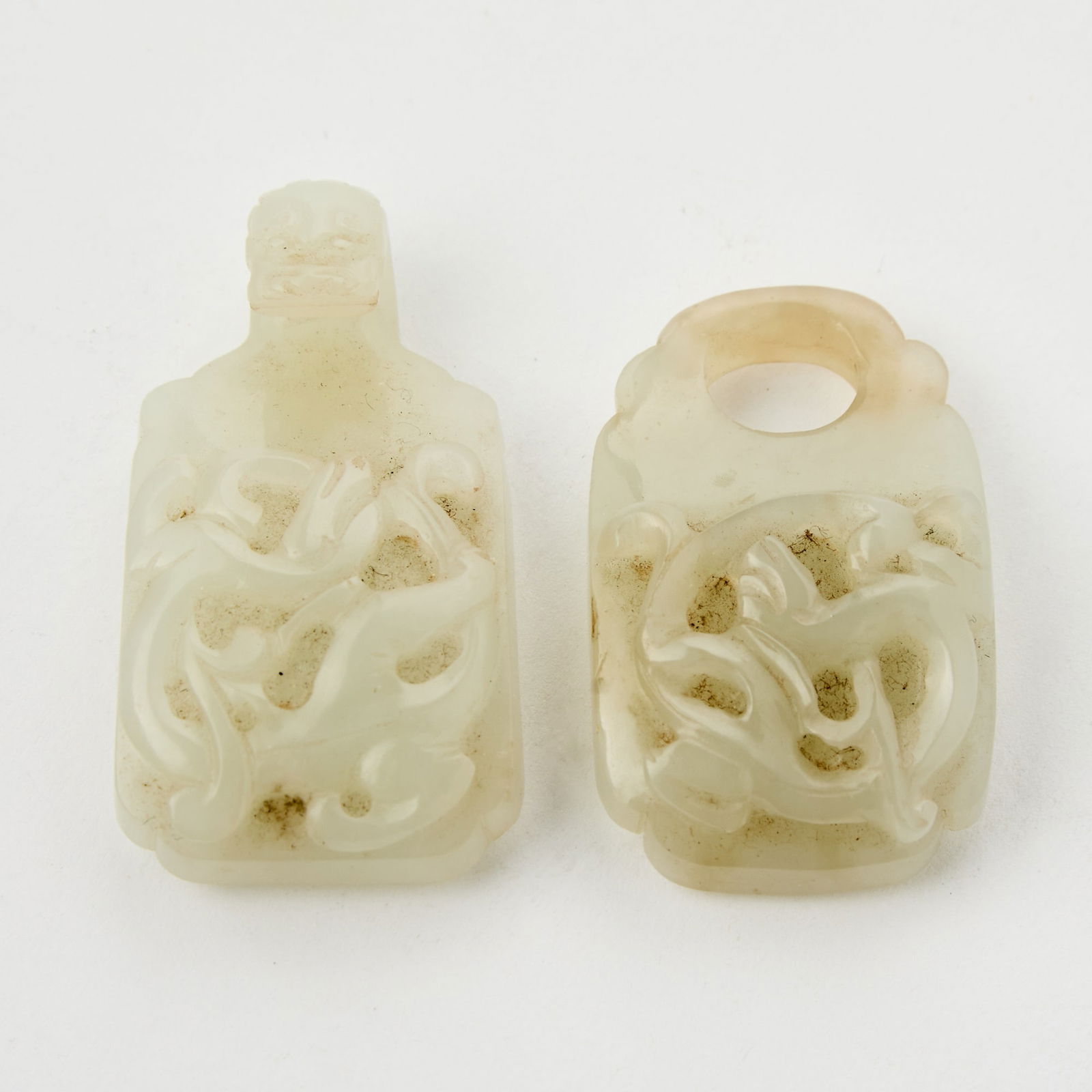 A Chinese Carved White Jade Two-Part Buckle Qing Dynasty (1 of 4)