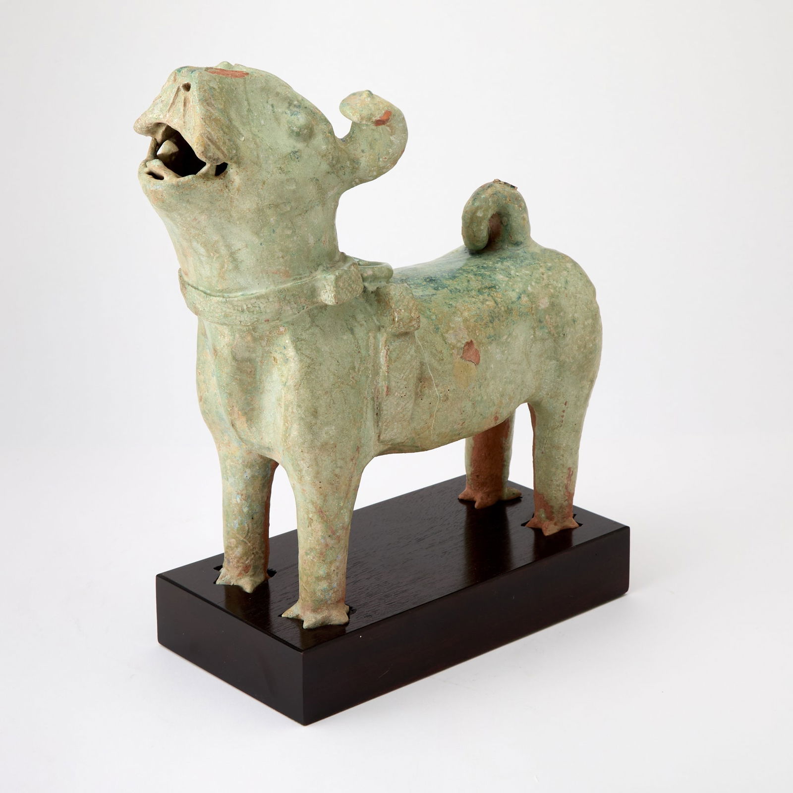 A Chinese Green Glazed Pottery Figure of a Dog Han Dynasty (1 of 5)